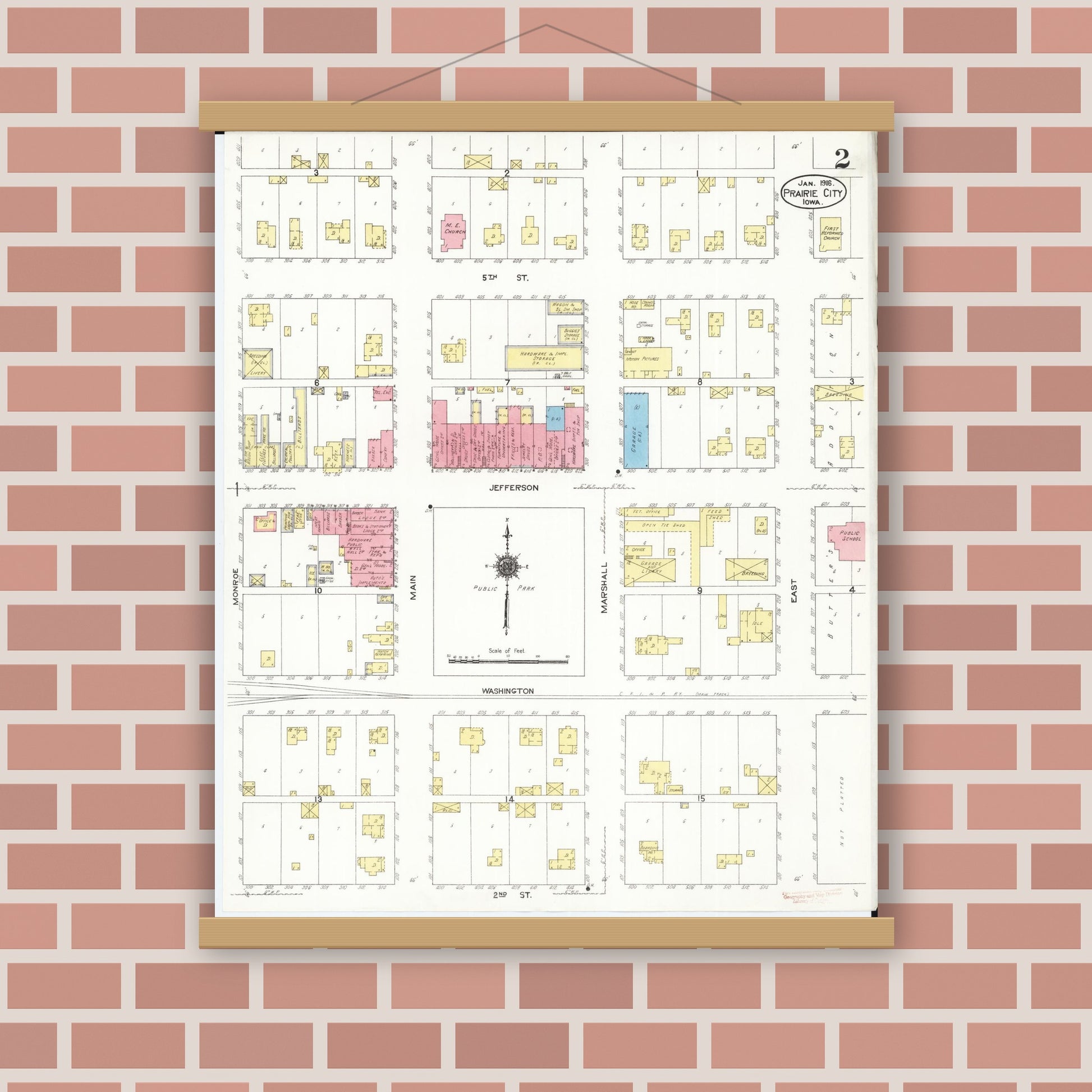 Old map wall art mockup — magnetic wood frame on brick wall — Sanborn Fire Insurance Map from Prairie City, Jasper County, Iowa (1916), Sheet #0002