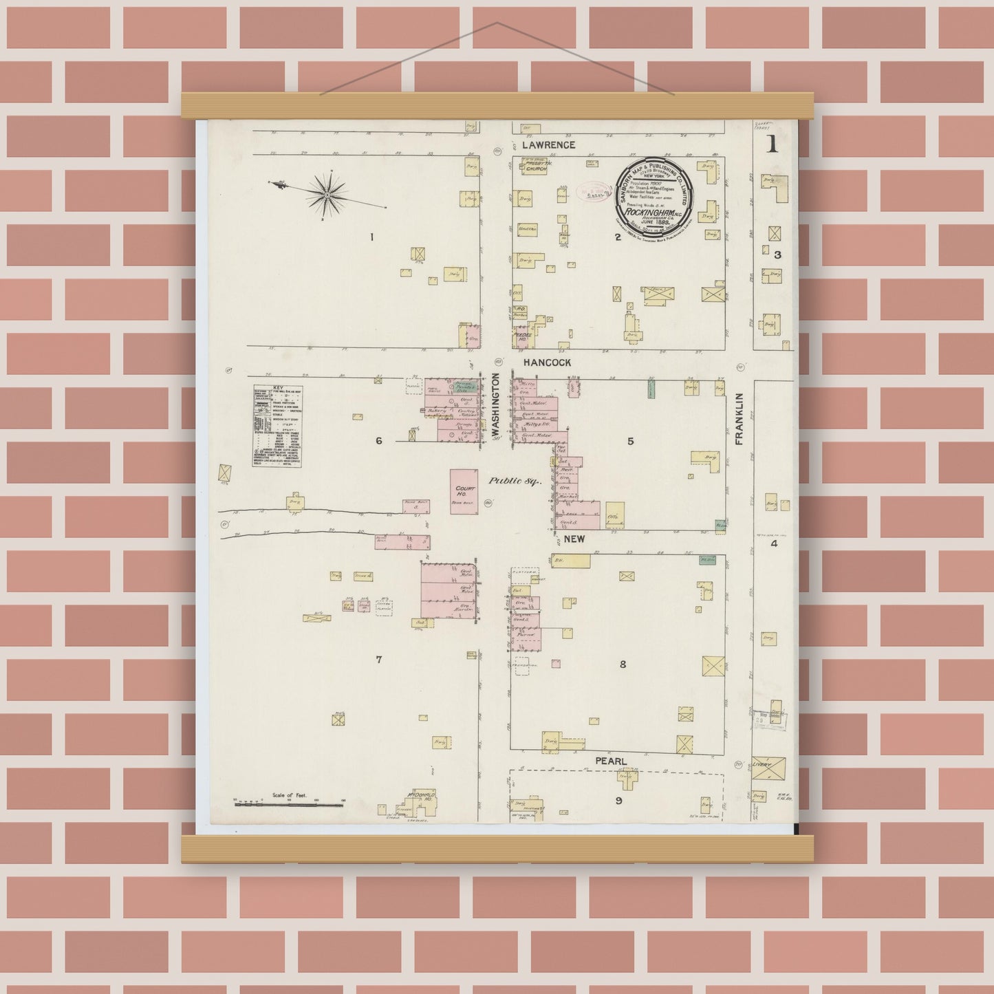 Old map wall art mockup — magnetic wood frame on brick wall — Sanborn Fire Insurance Map from Rockingham, Richmond County, North Carolina (1889), Sheet #0001