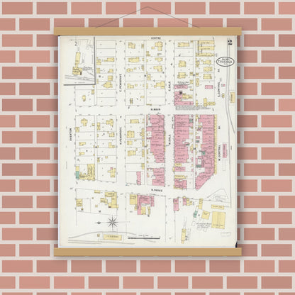 Old map wall art mockup — magnetic wood frame on brick wall — Sanborn Fire Insurance Map from Tuscola, Douglas County, Illinois (1897), Sheet #0002