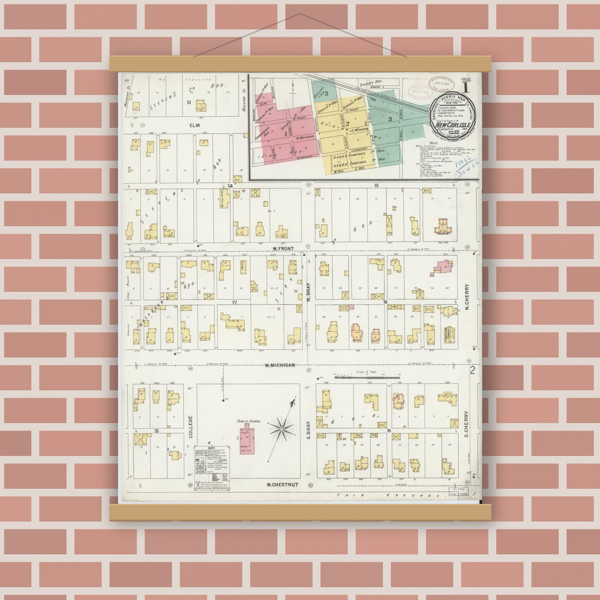 Old map wall art mockup — magnetic wood frame on brick wall — Sanborn Fire Insurance Map from New Carlisle, Saint Joseph County, Indiana (1899) - Complete Map Set