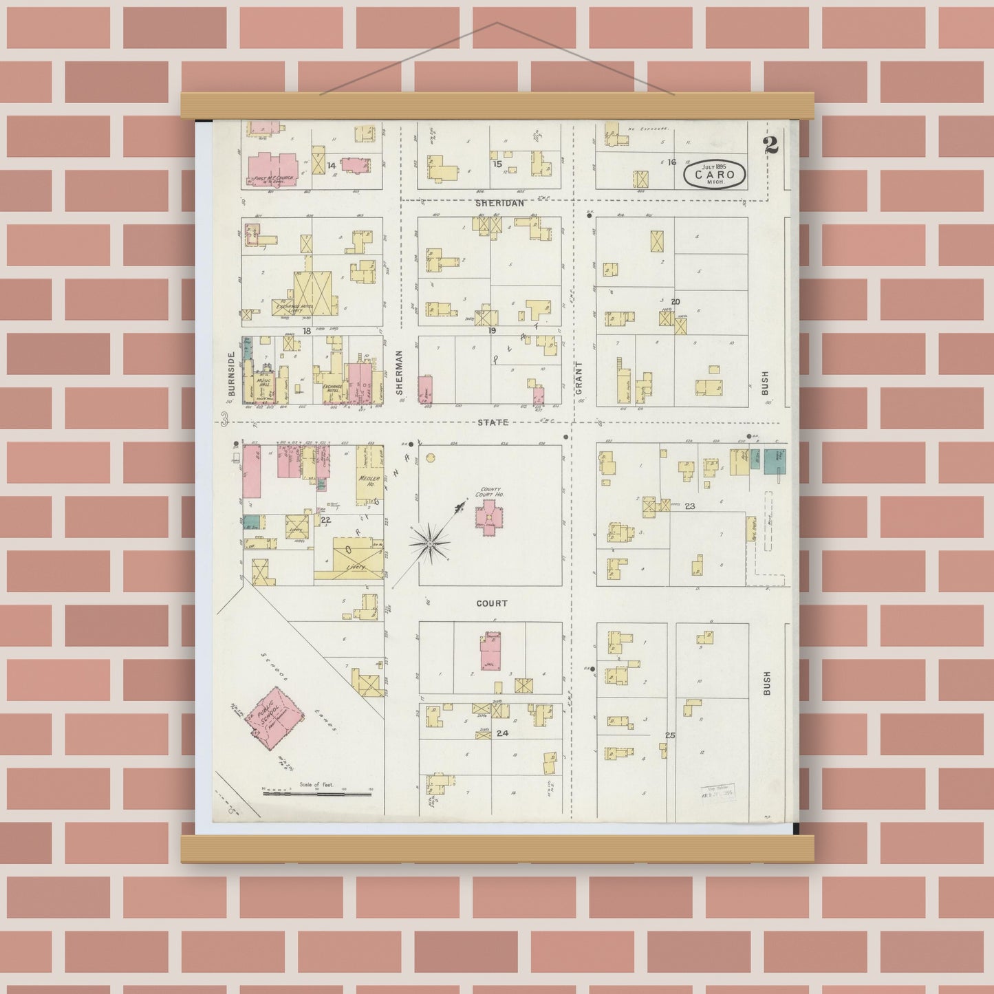 Old map wall art mockup — magnetic wood frame on brick wall — Sanborn Fire Insurance Map from Caro, Tuscola County, Michigan (1895), Sheet #0002