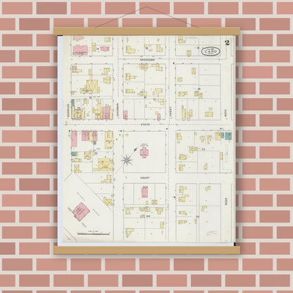 Old map wall art mockup — magnetic wood frame on brick wall — Sanborn Fire Insurance Map from Caro, Tuscola County, Michigan (1895), Sheet #0002
