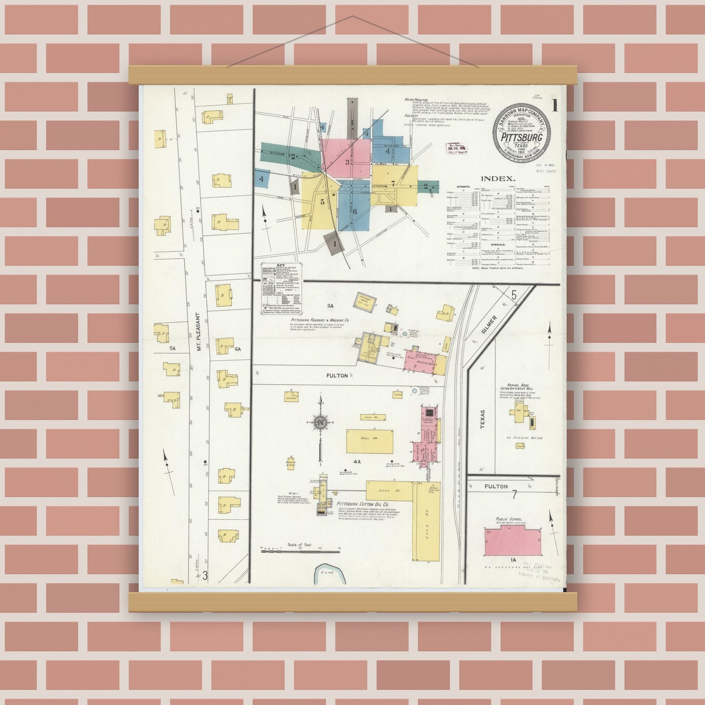 Old map wall art mockup — magnetic wood frame on brick wall — Sanborn Fire Insurance Map from Pittsburg, Camp County, Texas (1911), Sheet #0001