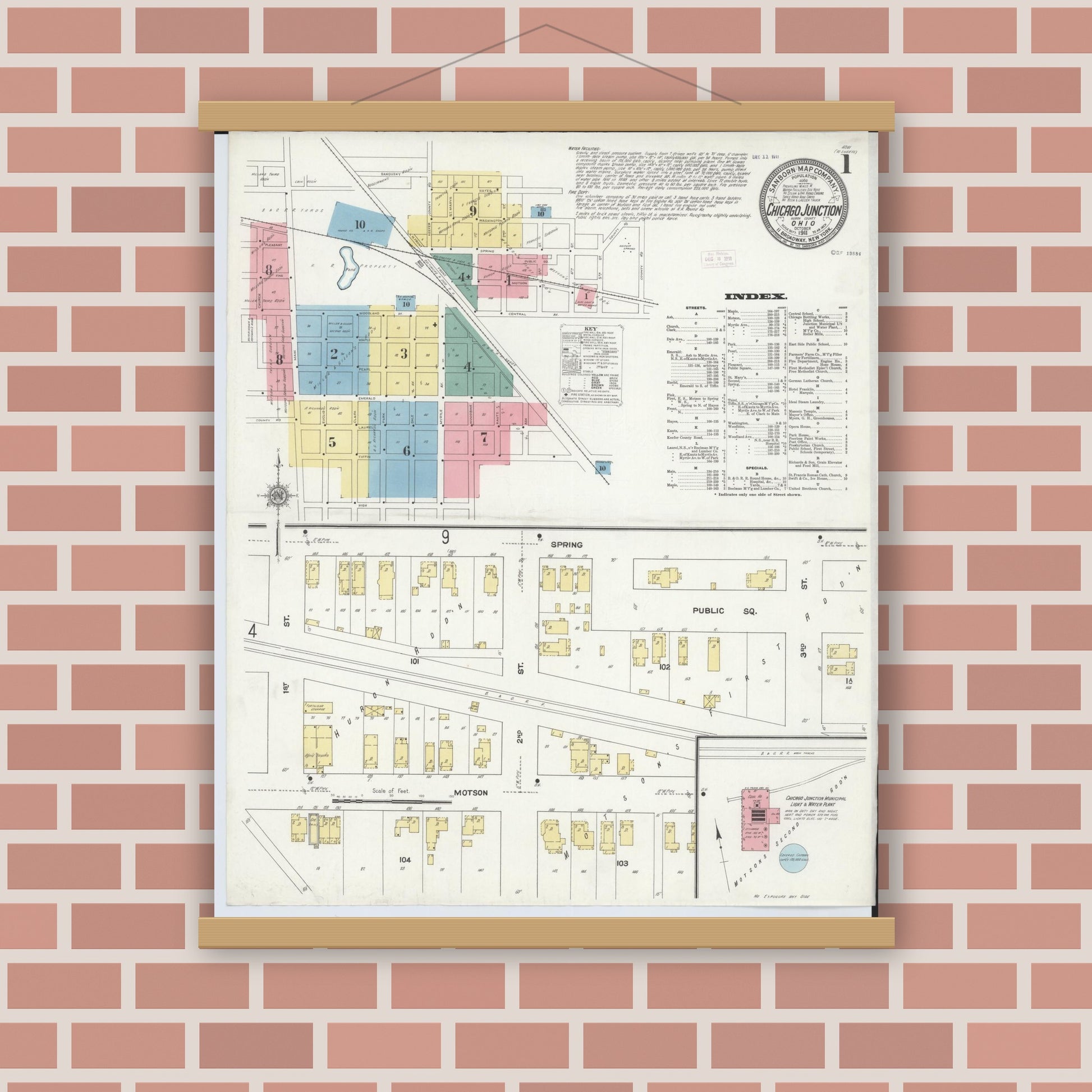 Old map wall art mockup — magnetic wood frame on brick wall — Sanborn Fire Insurance Map from Chicago Junction, Huron County, Ohio (1911) - Complete Map Set