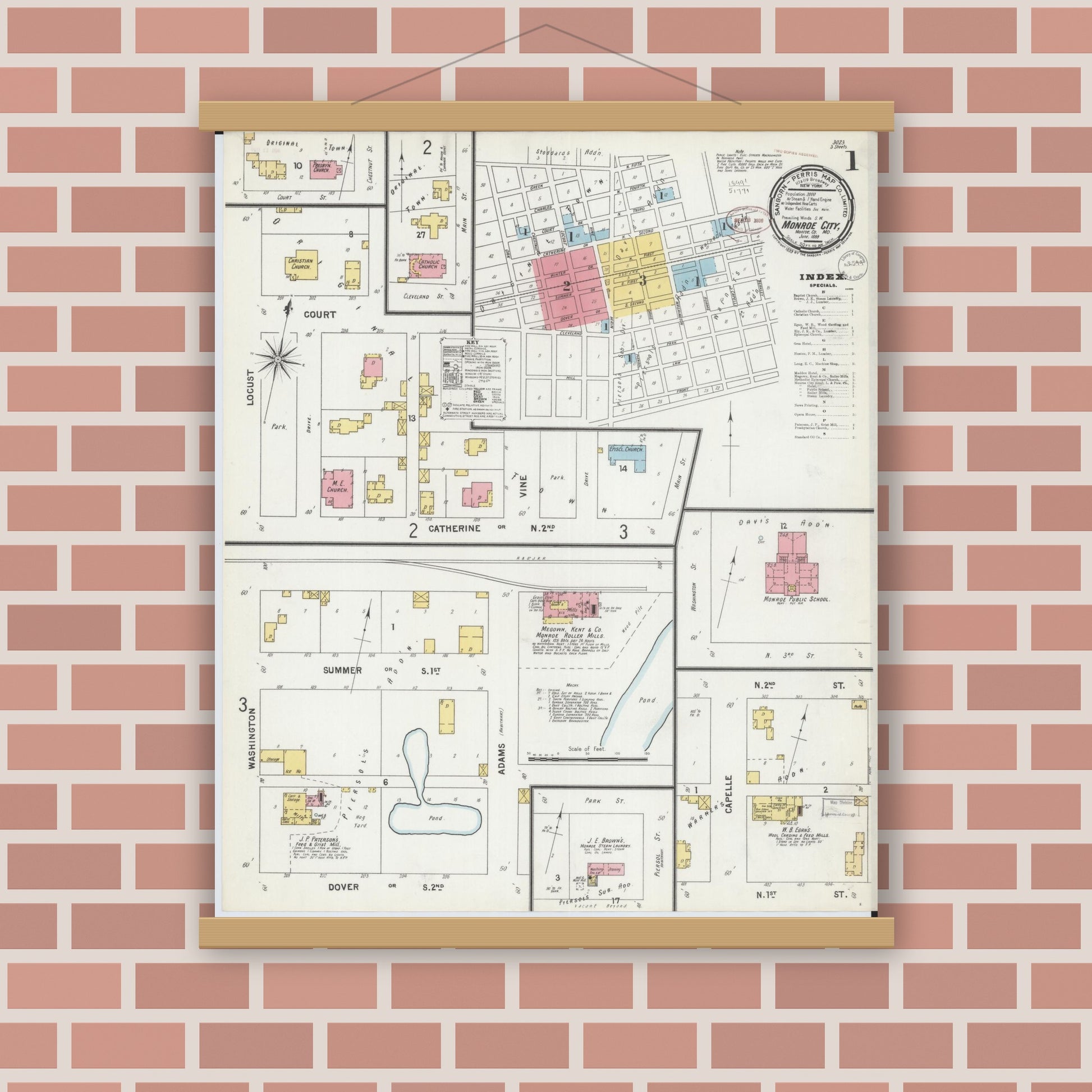 Old map wall art mockup — magnetic wood frame on brick wall — Sanborn Fire Insurance Map from Monroe City, Monroe County, Missouri (1899), Sheet #0001