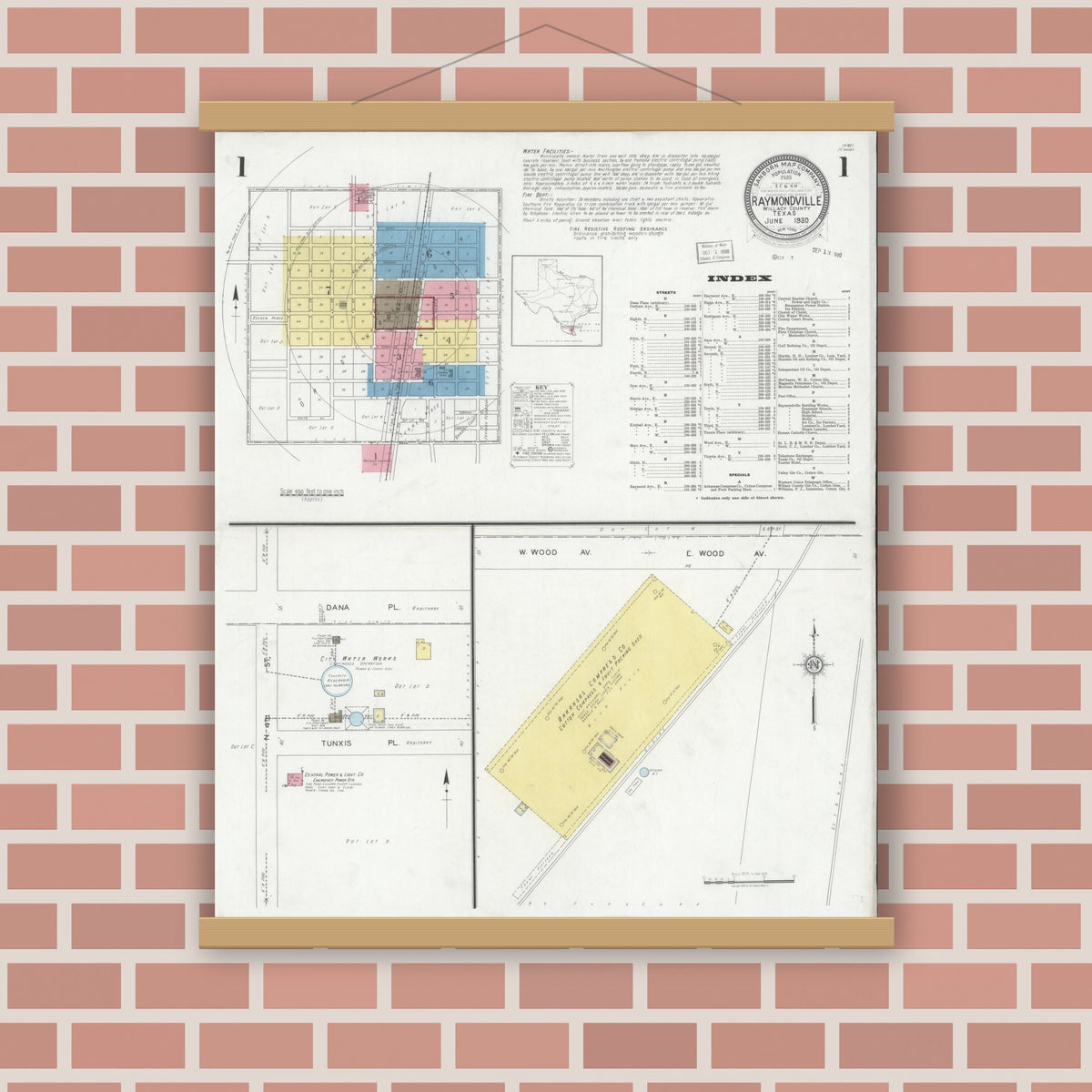 Old map wall art mockup — magnetic wood frame on brick wall — Sanborn Fire Insurance Map from Raymondville, Willacy County, Texas (1930) - Complete Map Set