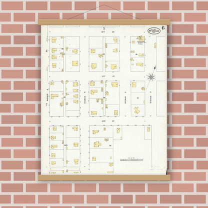 Old map wall art mockup — magnetic wood frame on brick wall — Sanborn Fire Insurance Map from McGregor, McLennan County, Texas (1909), Sheet #0006