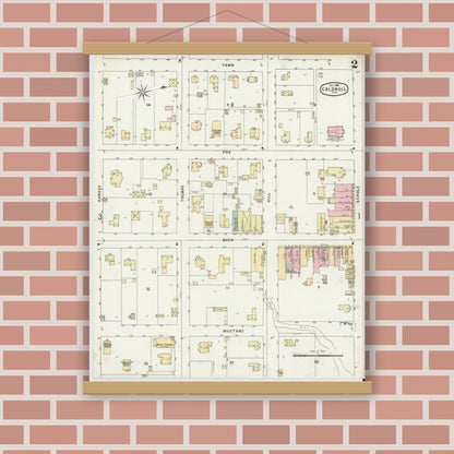 Old map wall art mockup — magnetic wood frame on brick wall — Sanborn Fire Insurance Map from Caldwell, Burleson County, Texas (1896), Sheet #0002