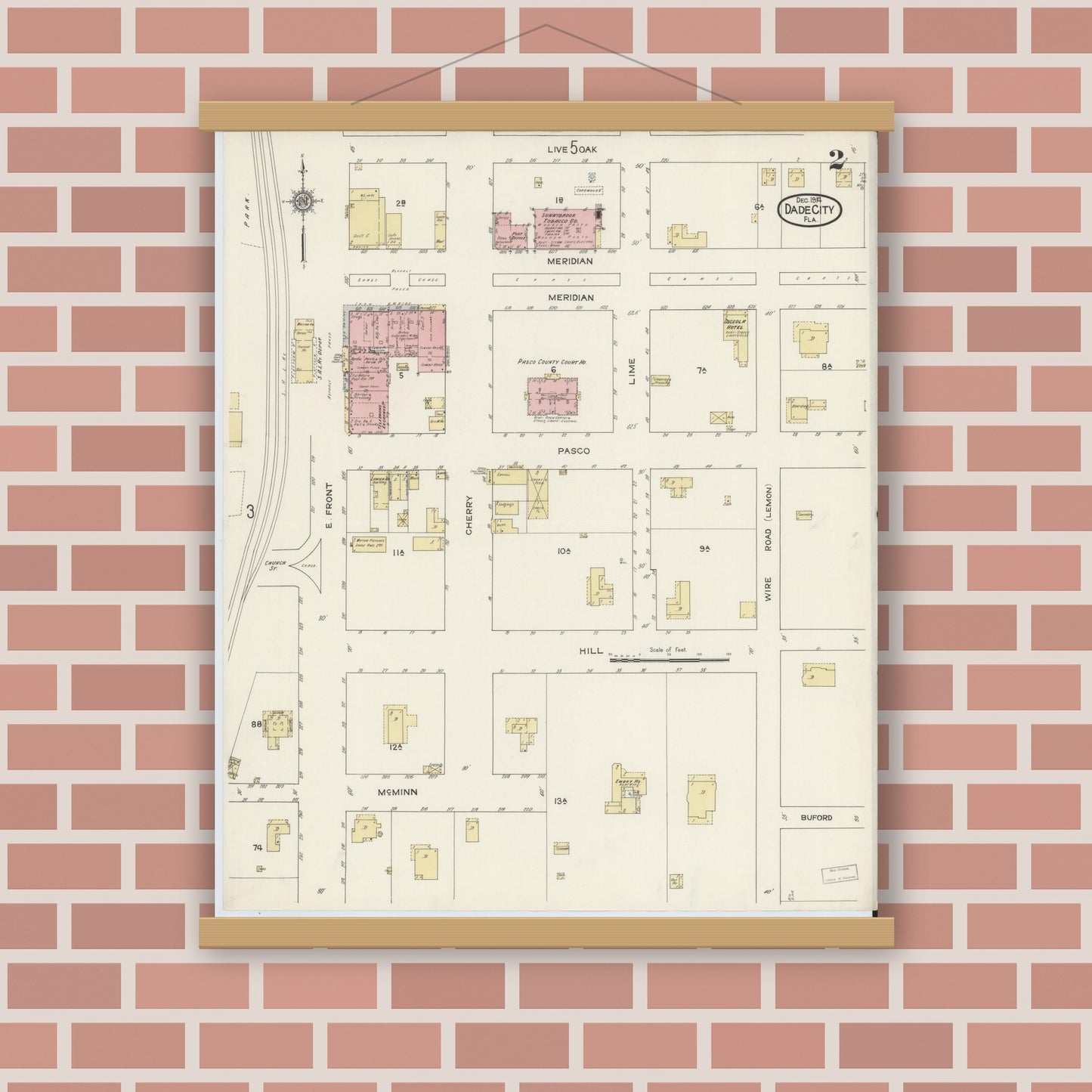 Old map wall art mockup — magnetic wood frame on brick wall — Sanborn Fire Insurance Map from Dade City, Pasco County, Florida (1914), Sheet #0002