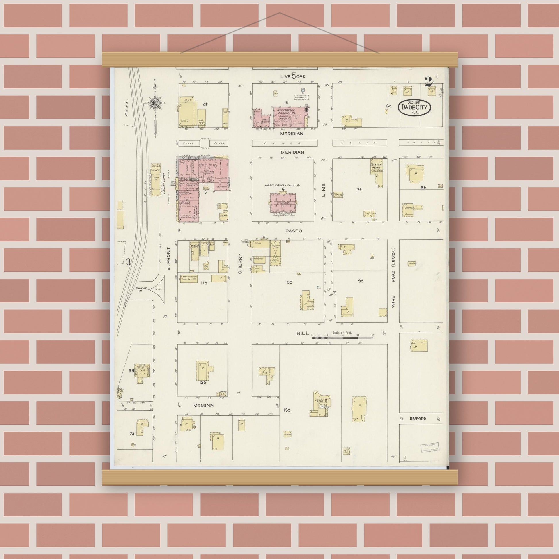 Old map wall art mockup — magnetic wood frame on brick wall — Sanborn Fire Insurance Map from Dade City, Pasco County, Florida (1914), Sheet #0002