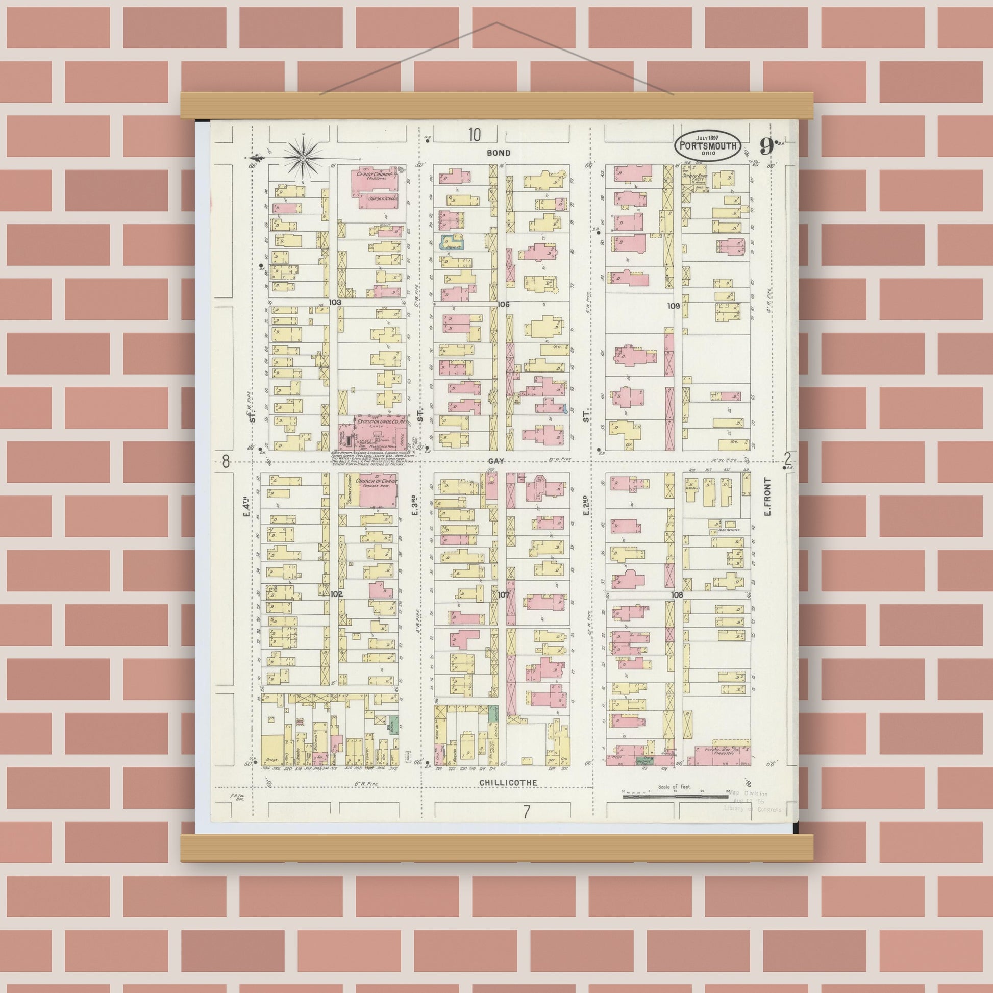 Old map wall art mockup — magnetic wood frame on brick wall — Sanborn Fire Insurance Map from Portsmouth, Scioto County, Ohio (1897), Sheet #0009