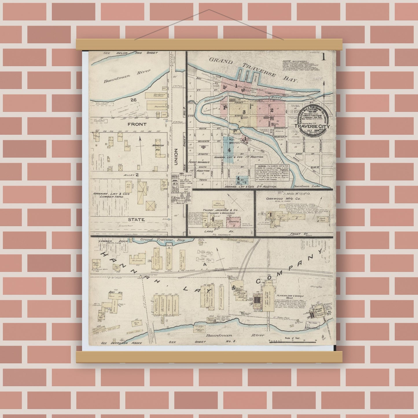 Old map wall art mockup — magnetic wood frame on brick wall — Sanborn Fire Insurance Map from Traverse City, Grand Traverse County, Michigan (1884), Sheet #0001