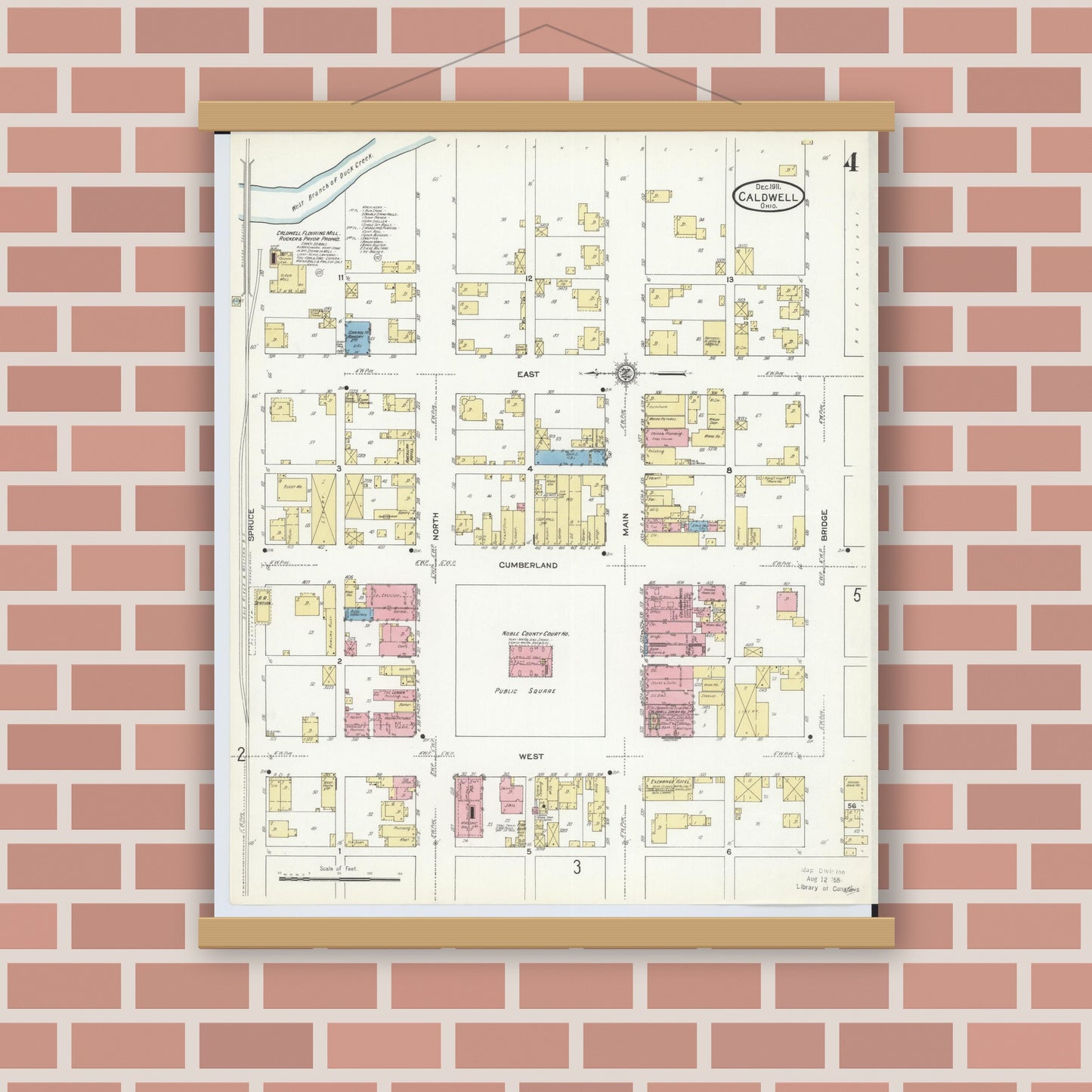 Old map wall art mockup — magnetic wood frame on brick wall — Sanborn Fire Insurance Map from Caldwell, Noble County, Ohio (1911), Sheet #0004