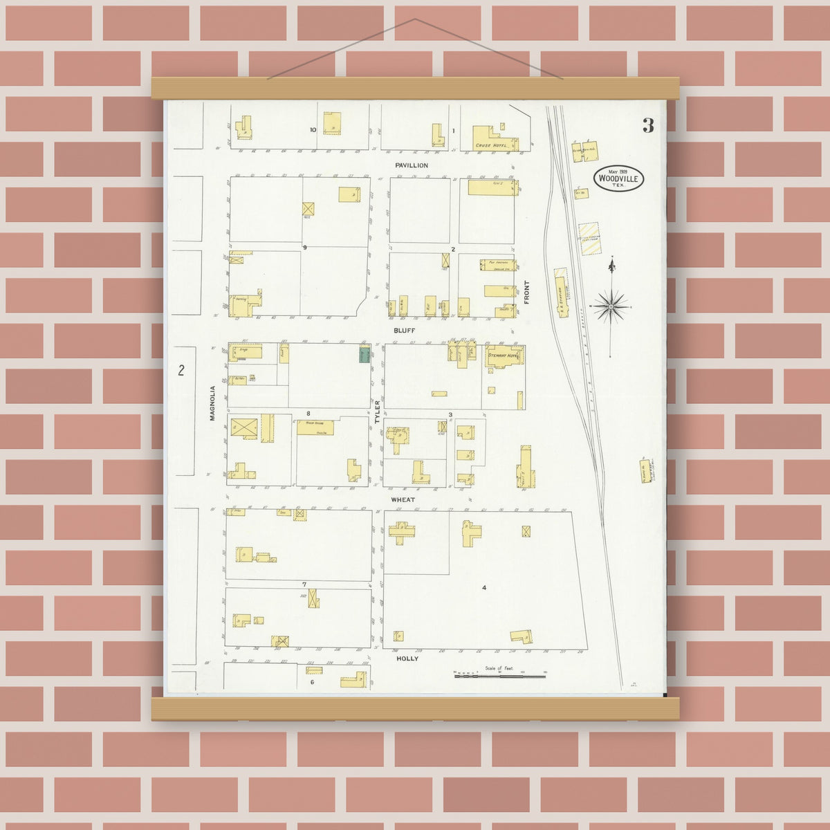 Old map wall art mockup — magnetic wood frame on brick wall — Sanborn Fire Insurance Map from Wolfe City, Hunt County, Texas (1909), Sheet #0003