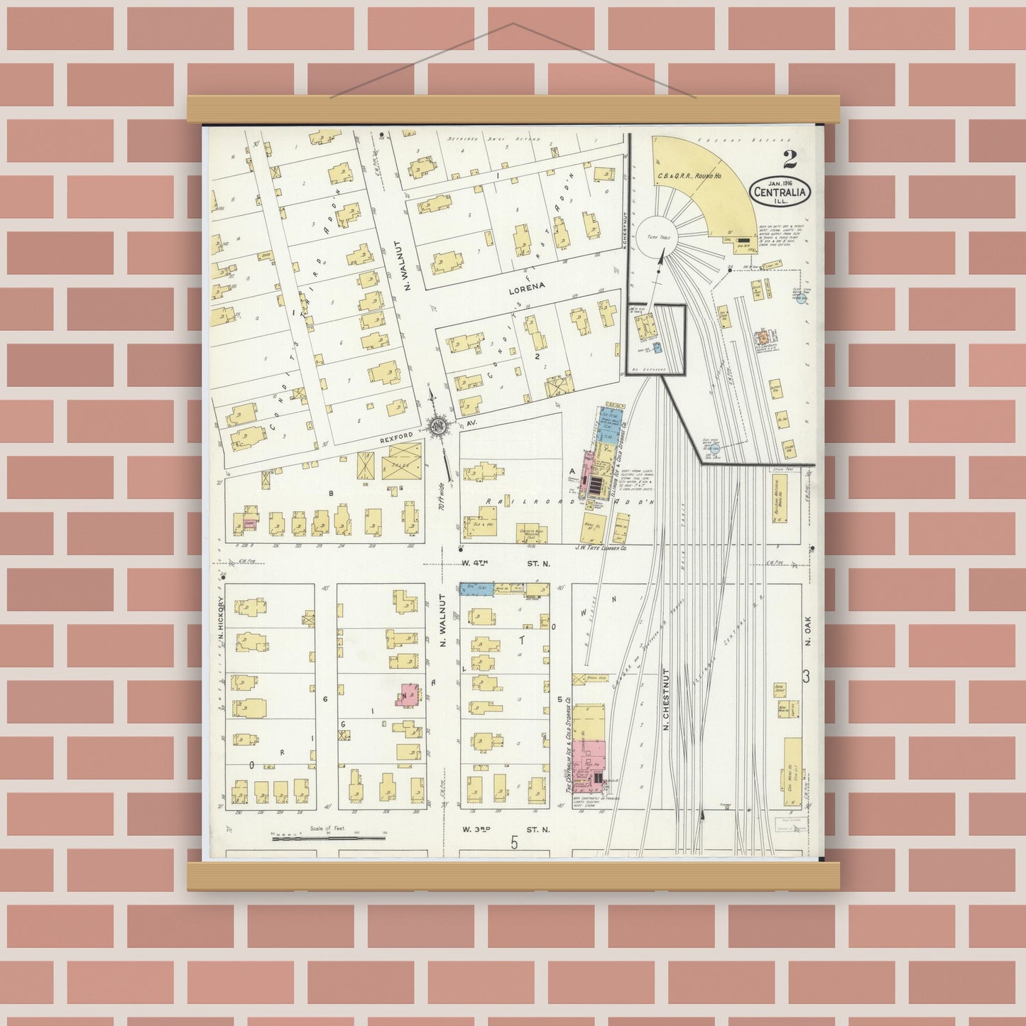 Old map wall art mockup — magnetic wood frame on brick wall — Sanborn Fire Insurance Map from Centralia, Marion, Clinton, Jefferson, and Washington Counties, Illinois (1916), Sheet #0002