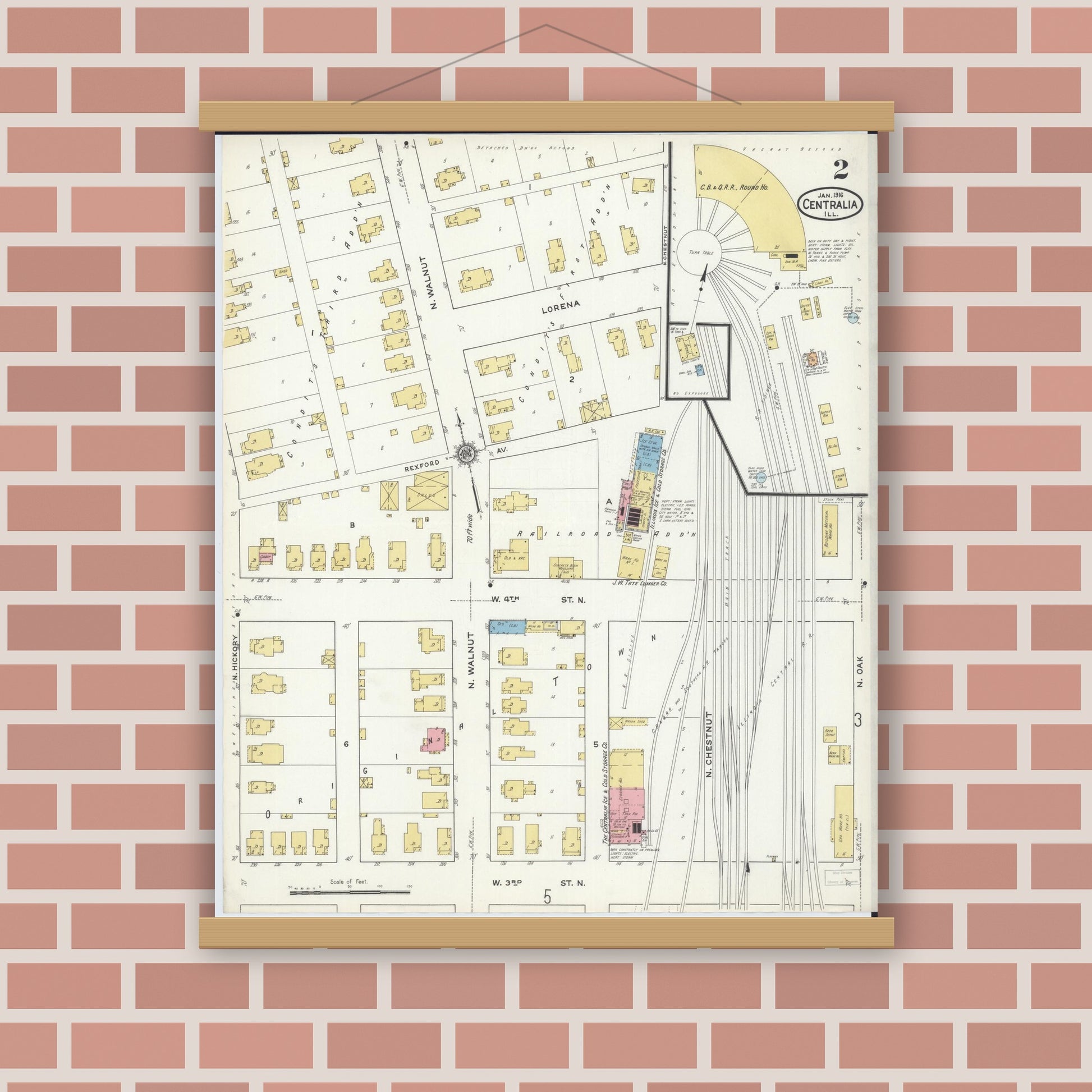 Old map wall art mockup — magnetic wood frame on brick wall — Sanborn Fire Insurance Map from Centralia, Marion, Clinton, Jefferson, and Washington Counties, Illinois (1916), Sheet #0002