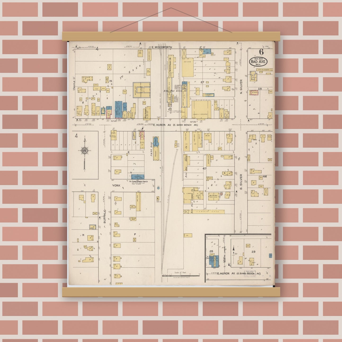 Old map wall art mockup — magnetic wood frame on brick wall — Sanborn Fire Insurance Map from Bad Axe, Huron County, Michigan (1922), Sheet #0006