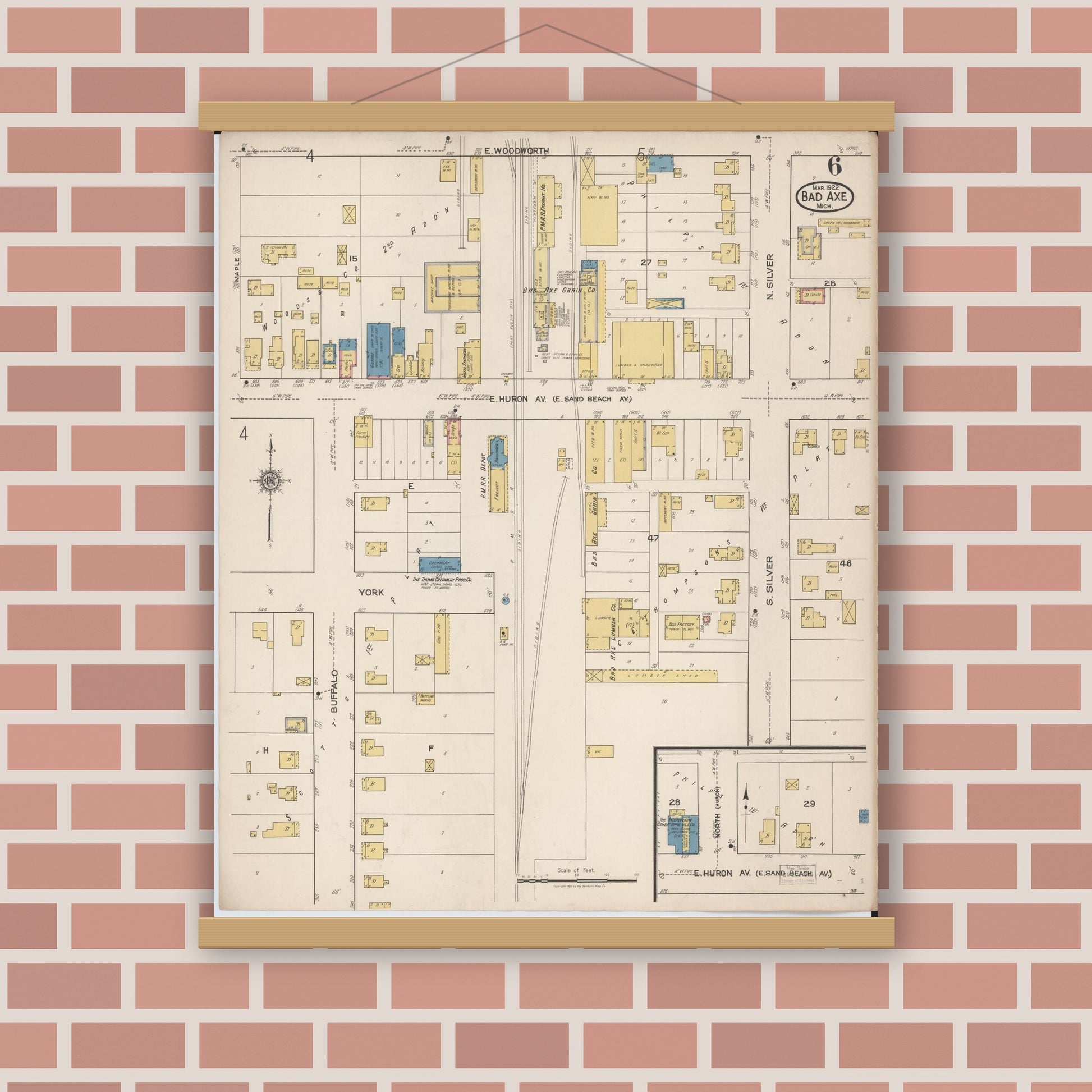 Old map wall art mockup — magnetic wood frame on brick wall — Sanborn Fire Insurance Map from Bad Axe, Huron County, Michigan (1922), Sheet #0006