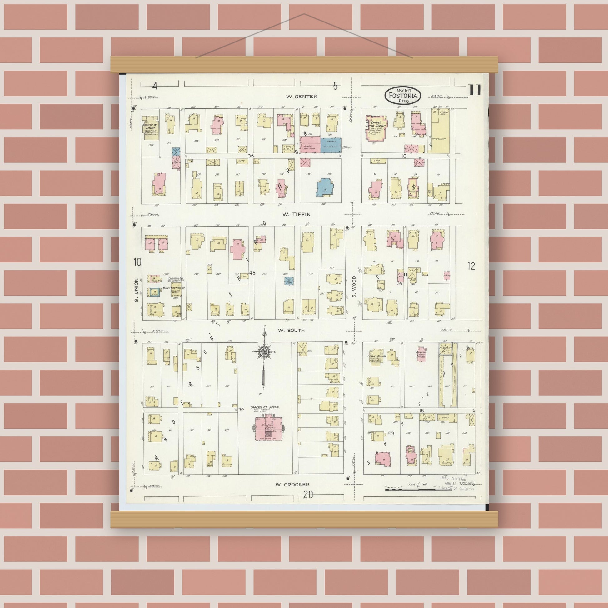 Old map wall art mockup — magnetic wood frame on brick wall — Sanborn Fire Insurance Map from Fostoria, Seneca, Hancock, And Wood Counties, Ohio (1914), Sheet #0011