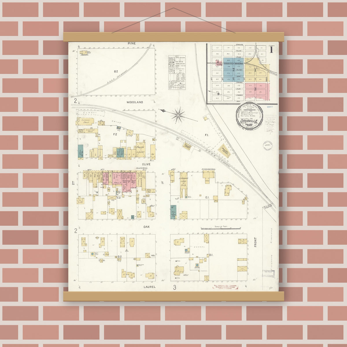 Old map wall art mockup — magnetic wood frame on brick wall — Sanborn Fire Insurance Map from Davis, Yolo County, California (1900), Sheet #0001