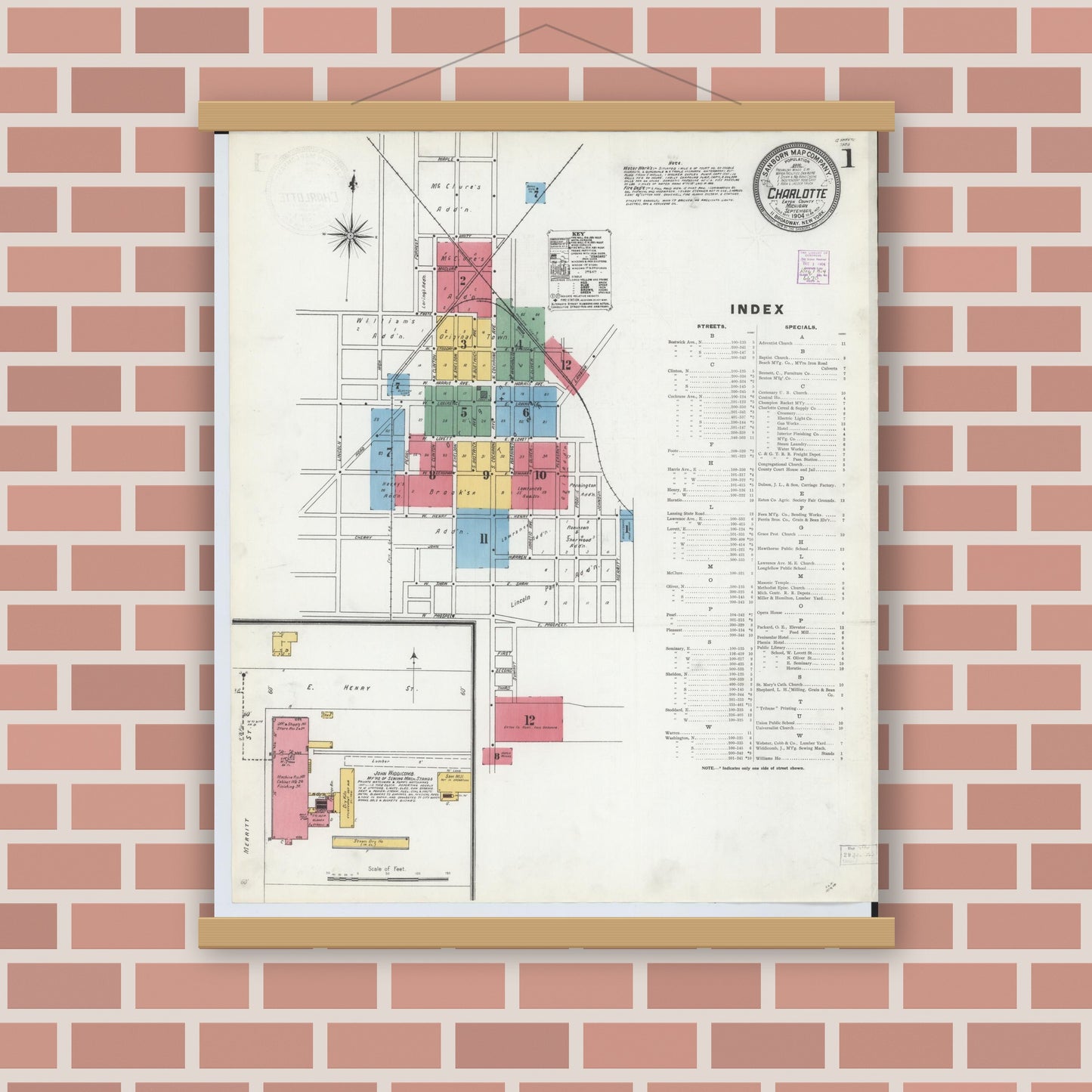 Old map wall art mockup — magnetic wood frame on brick wall — Sanborn Fire Insurance Map from Charlotte, Eaton County, Michigan (1904) - Complete Map Set