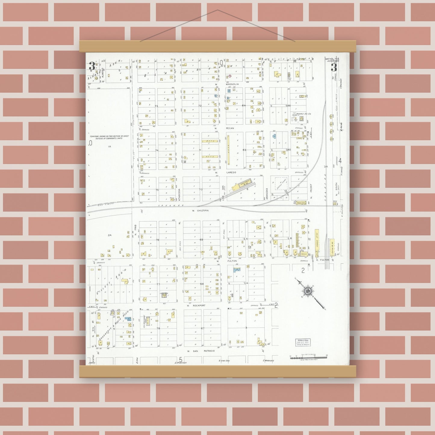 Old map wall art mockup — magnetic wood frame on brick wall — Sanborn Fire Insurance Map from Mathis, San Patricio County, Texas (1950), Sheet #0003