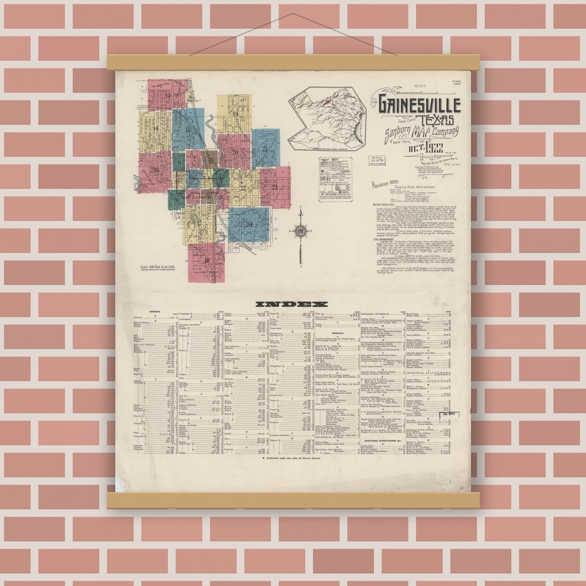 Old map wall art mockup — magnetic wood frame on brick wall — Sanborn Fire Insurance Map from Gainesville, Cooke County, Texas (1922) - Complete Map Set