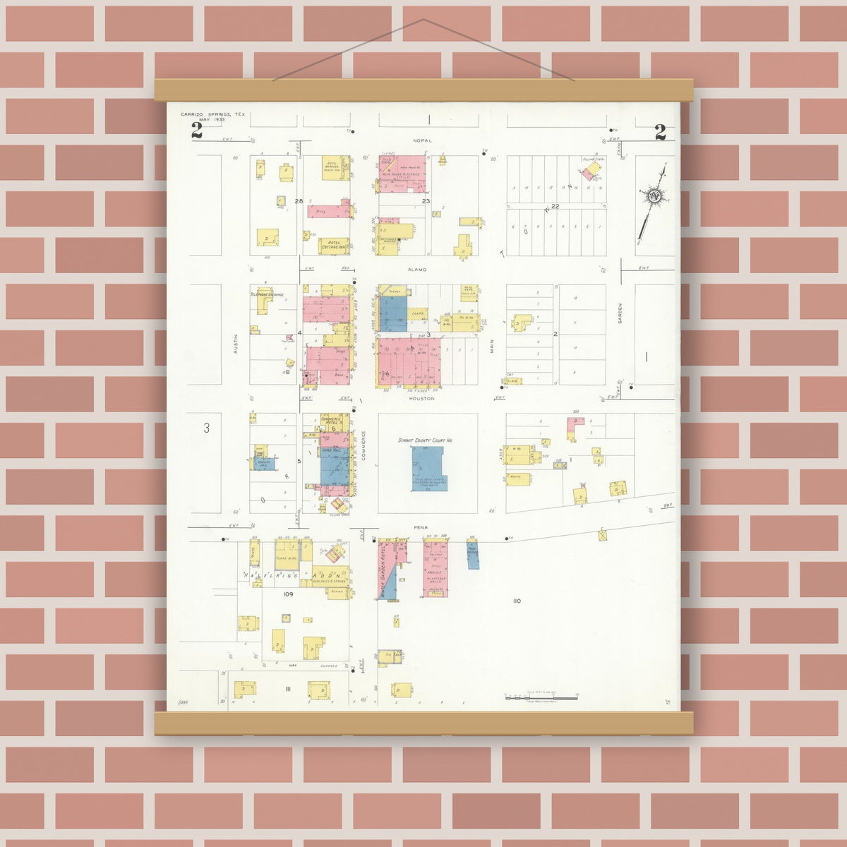 Old map wall art mockup — magnetic wood frame on brick wall — Sanborn Fire Insurance Map from Carrizo Springs, Dimmit County, Texas (1933), Sheet #0002