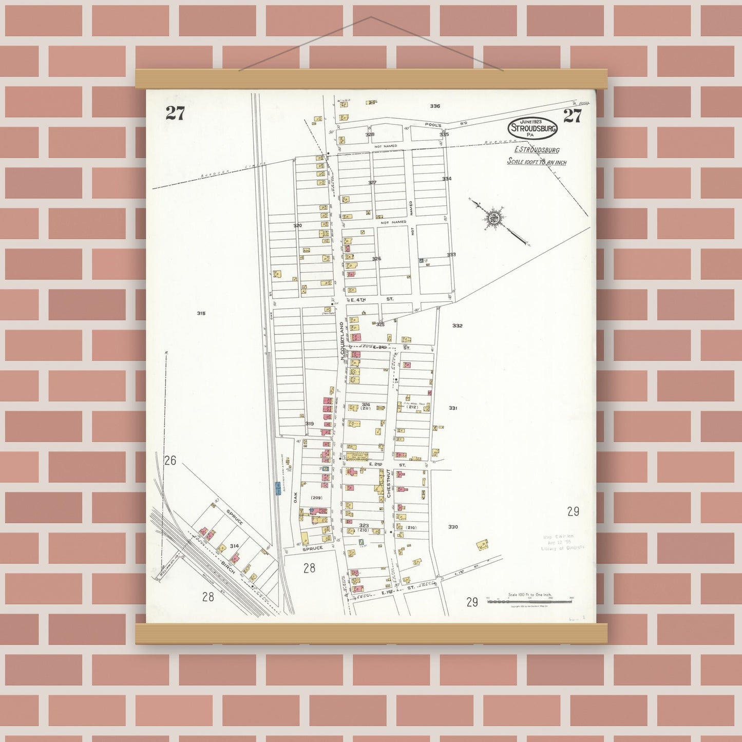 Old map wall art mockup — magnetic wood frame on brick wall — Sanborn Fire Insurance Map from Stroudsburg, Monroe County, Pennsylvania (1923), Sheet #0027