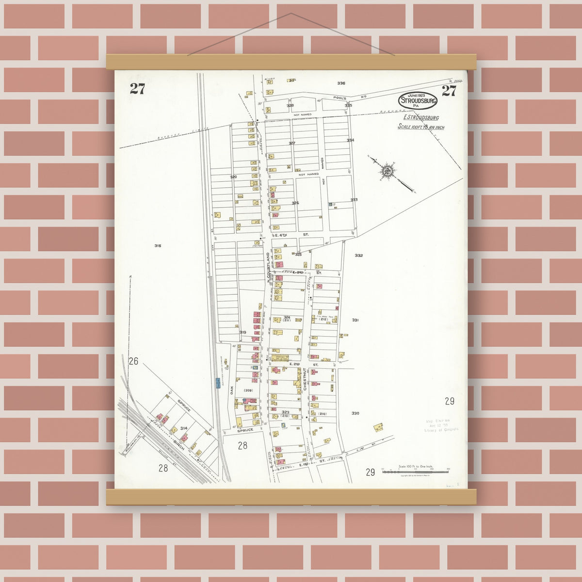Old map wall art mockup — magnetic wood frame on brick wall — Sanborn Fire Insurance Map from Stroudsburg, Monroe County, Pennsylvania (1923), Sheet #0027