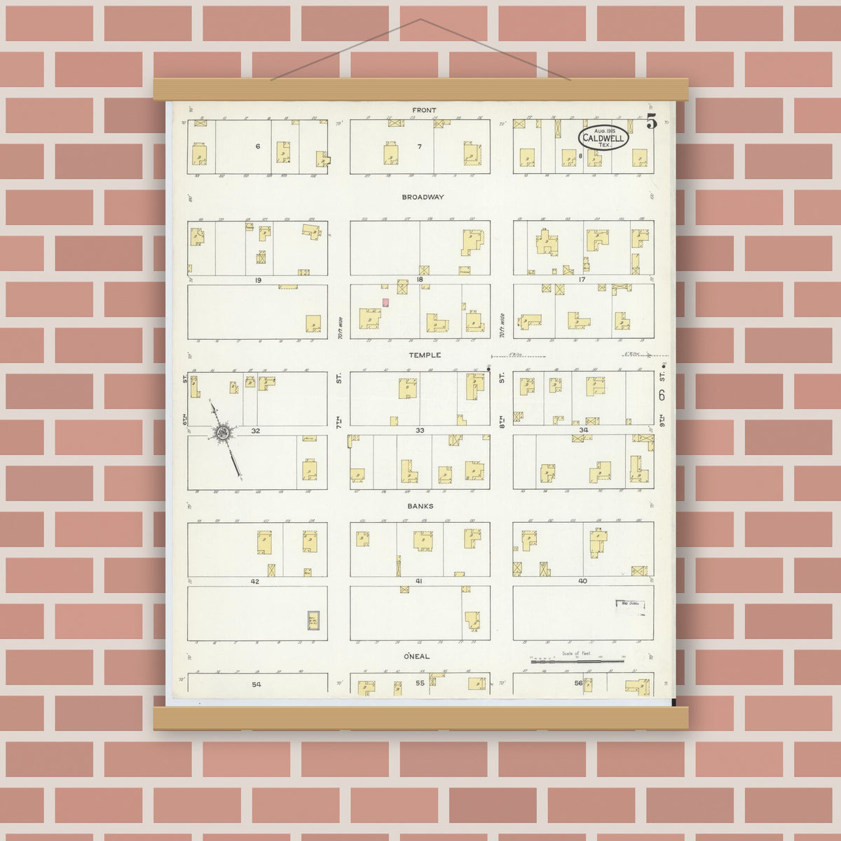 Old map wall art mockup — magnetic wood frame on brick wall — Sanborn Fire Insurance Map from Caldwell, Burleson County, Texas (1915), Sheet #0005