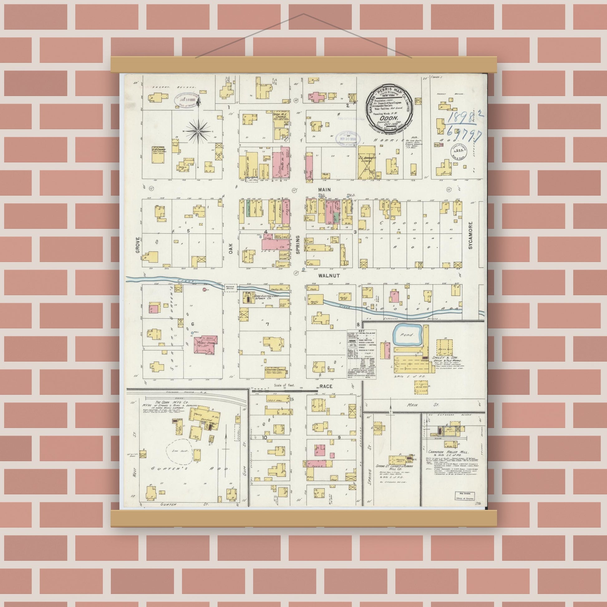 Old map wall art mockup — magnetic wood frame on brick wall — Sanborn Fire Insurance Map from Odon, Daviess County, Indiana (1898), Sheet #0001