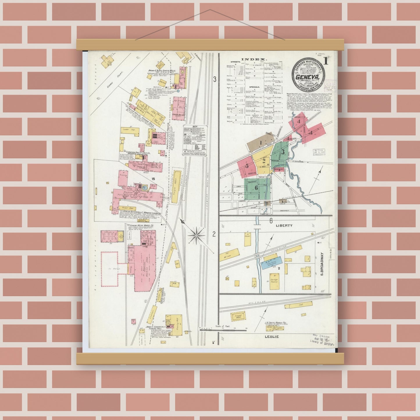 Old map wall art mockup — magnetic wood frame on brick wall — Sanborn Fire Insurance Map from Geneva, Ashtabula County, Ohio (1904), Sheet #0001