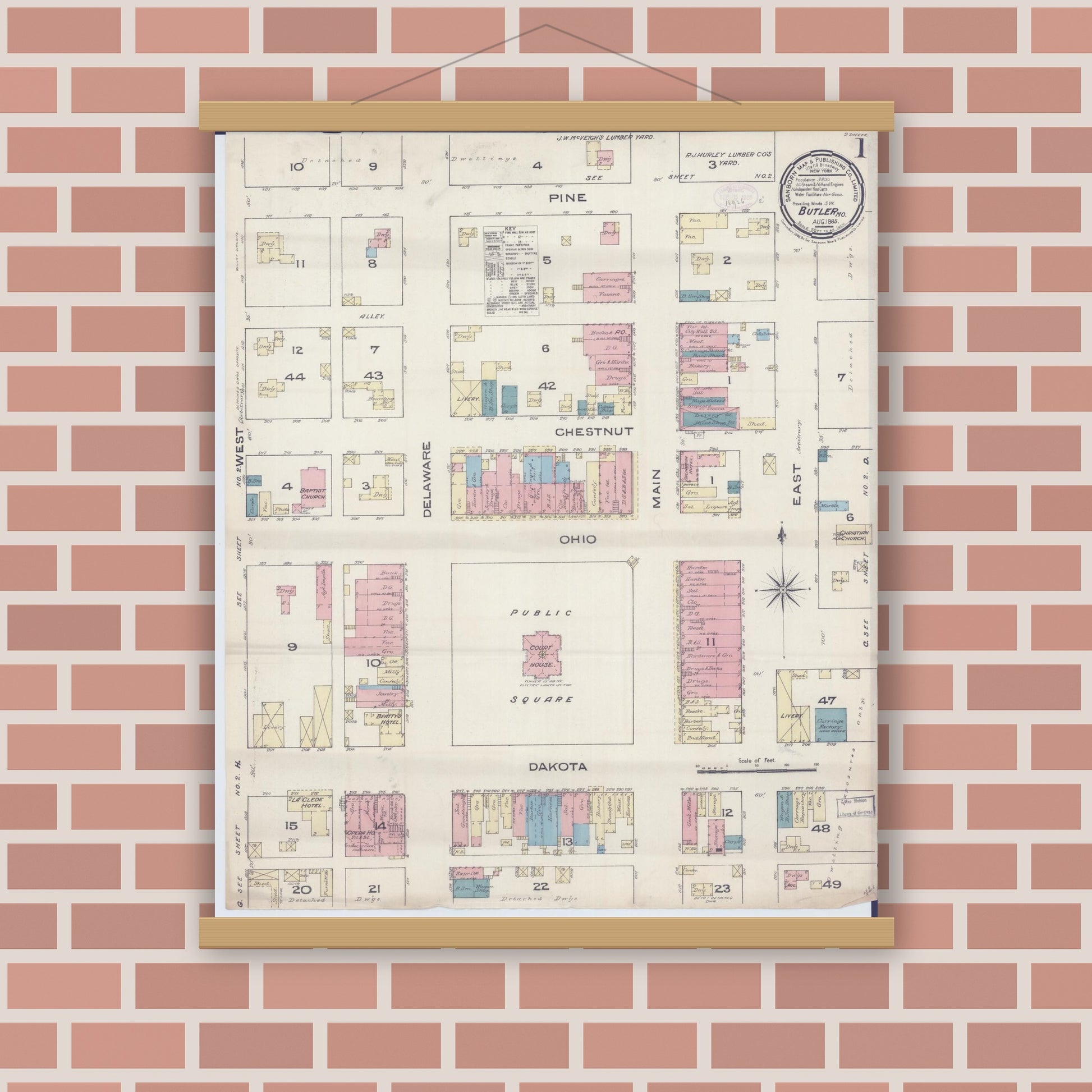 Old map wall art mockup — magnetic wood frame on brick wall — Sanborn Fire Insurance Map from Butler, Bates County, Missouri (1885) - Complete Map Set