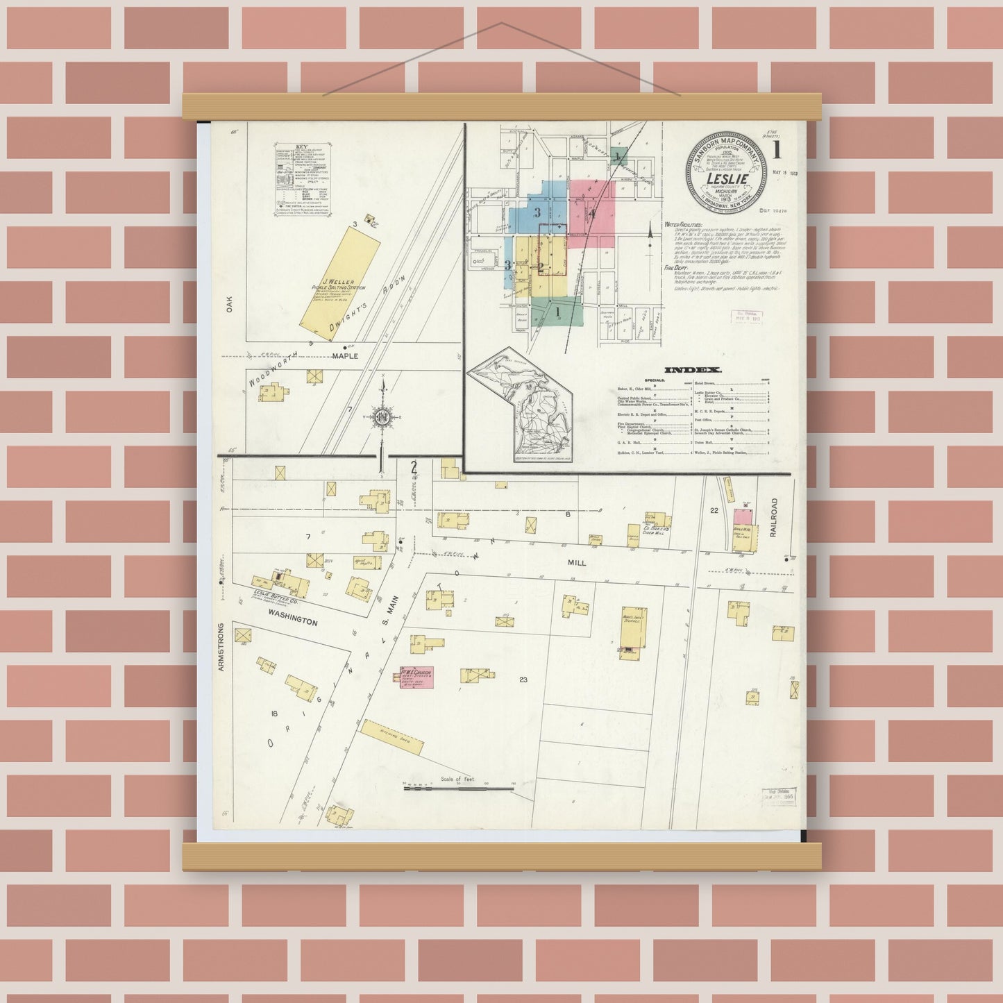 Old map wall art mockup — magnetic wood frame on brick wall — Sanborn Fire Insurance Map from Leslie, Ingham County, Michigan (1913), Sheet #0001