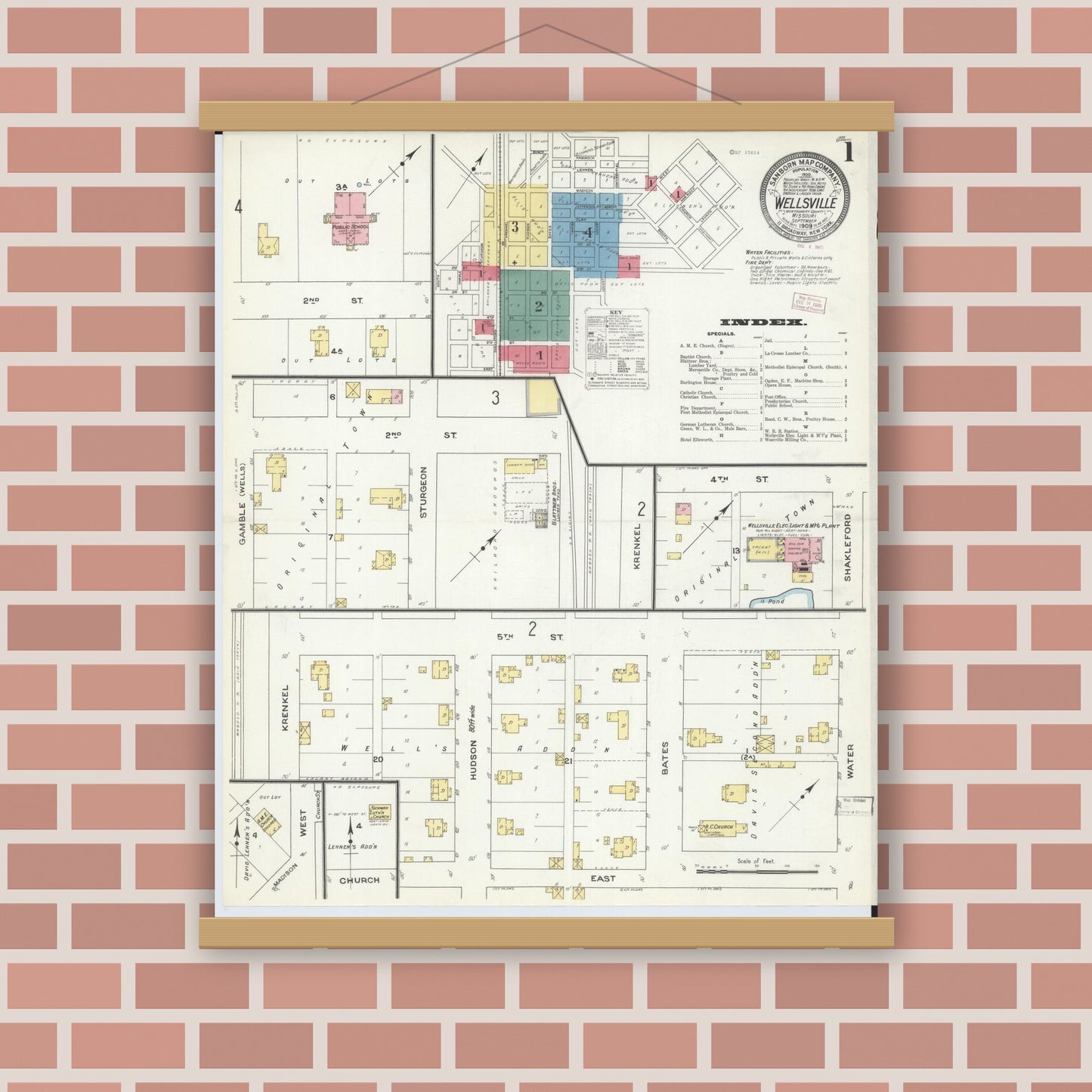 Old map wall art mockup — magnetic wood frame on brick wall — Sanborn Fire Insurance Map from Wellsville, Montgomery County, Missouri (1909) - Complete Map Set