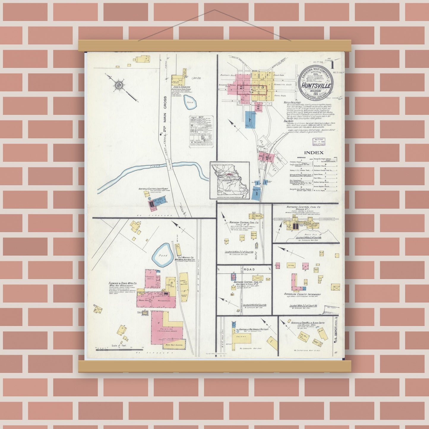 Old map wall art mockup — magnetic wood frame on brick wall — Sanborn Fire Insurance Map from Huntsville, Randolph County, Missouri (1916), Sheet #0001
