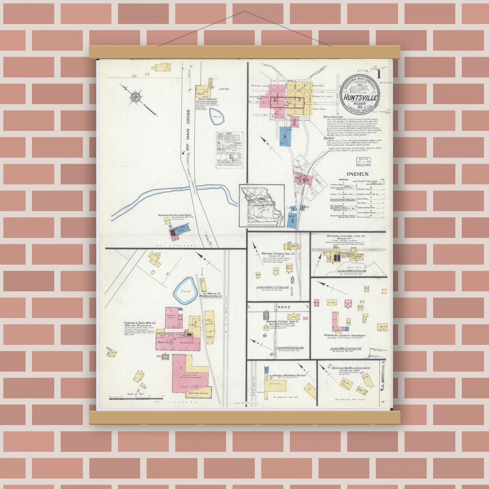 Old map wall art mockup — magnetic wood frame on brick wall — Sanborn Fire Insurance Map from Huntsville, Randolph County, Missouri (1916), Sheet #0001