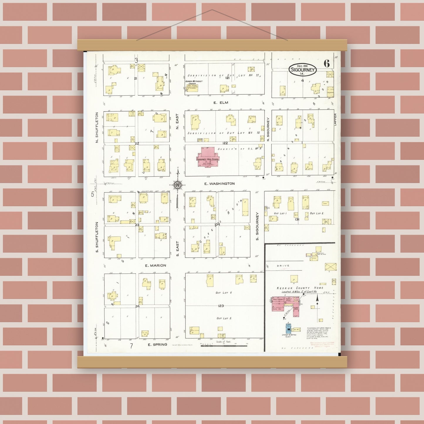 Old map wall art mockup — magnetic wood frame on brick wall — Sanborn Fire Insurance Map from Sigourney, Kiokuk County, Iowa (1916), Sheet #0006