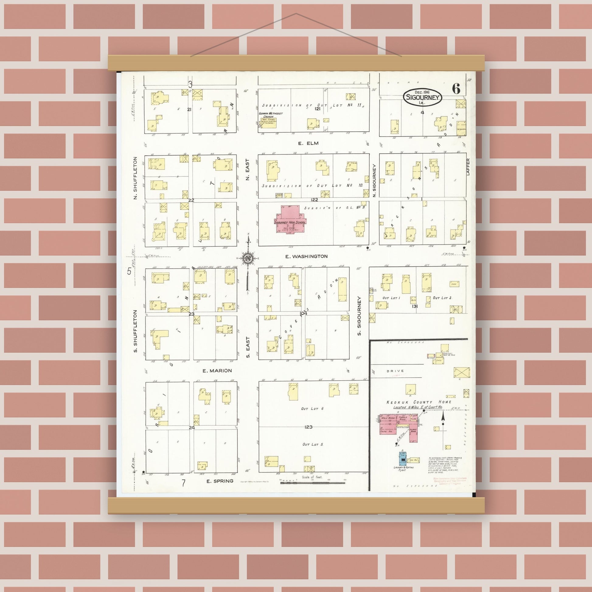 Old map wall art mockup — magnetic wood frame on brick wall — Sanborn Fire Insurance Map from Sigourney, Kiokuk County, Iowa (1916), Sheet #0006