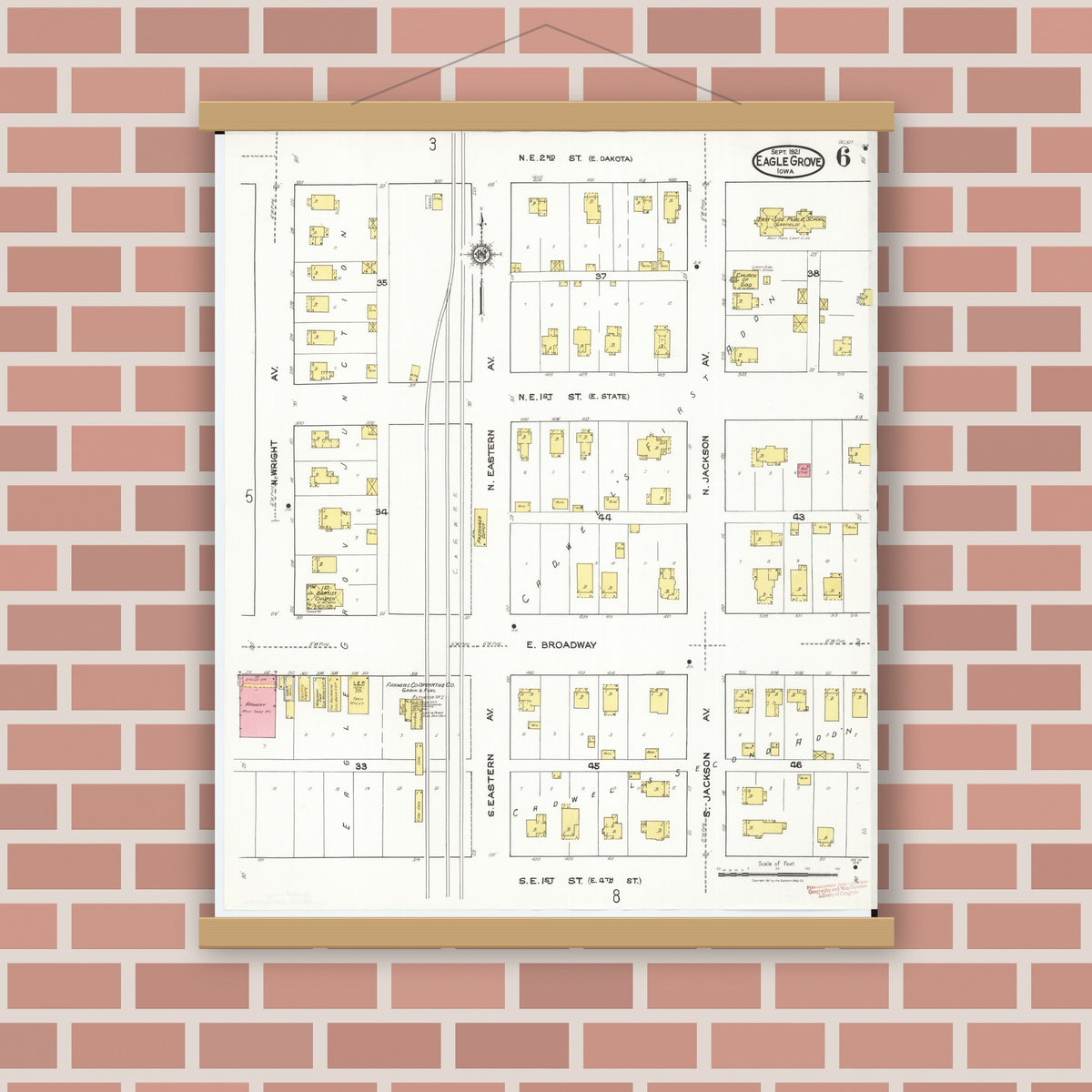 Old map wall art mockup — magnetic wood frame on brick wall — Sanborn Fire Insurance Map from Eagle Grove, Wright County, Iowa (1921), Sheet #0006