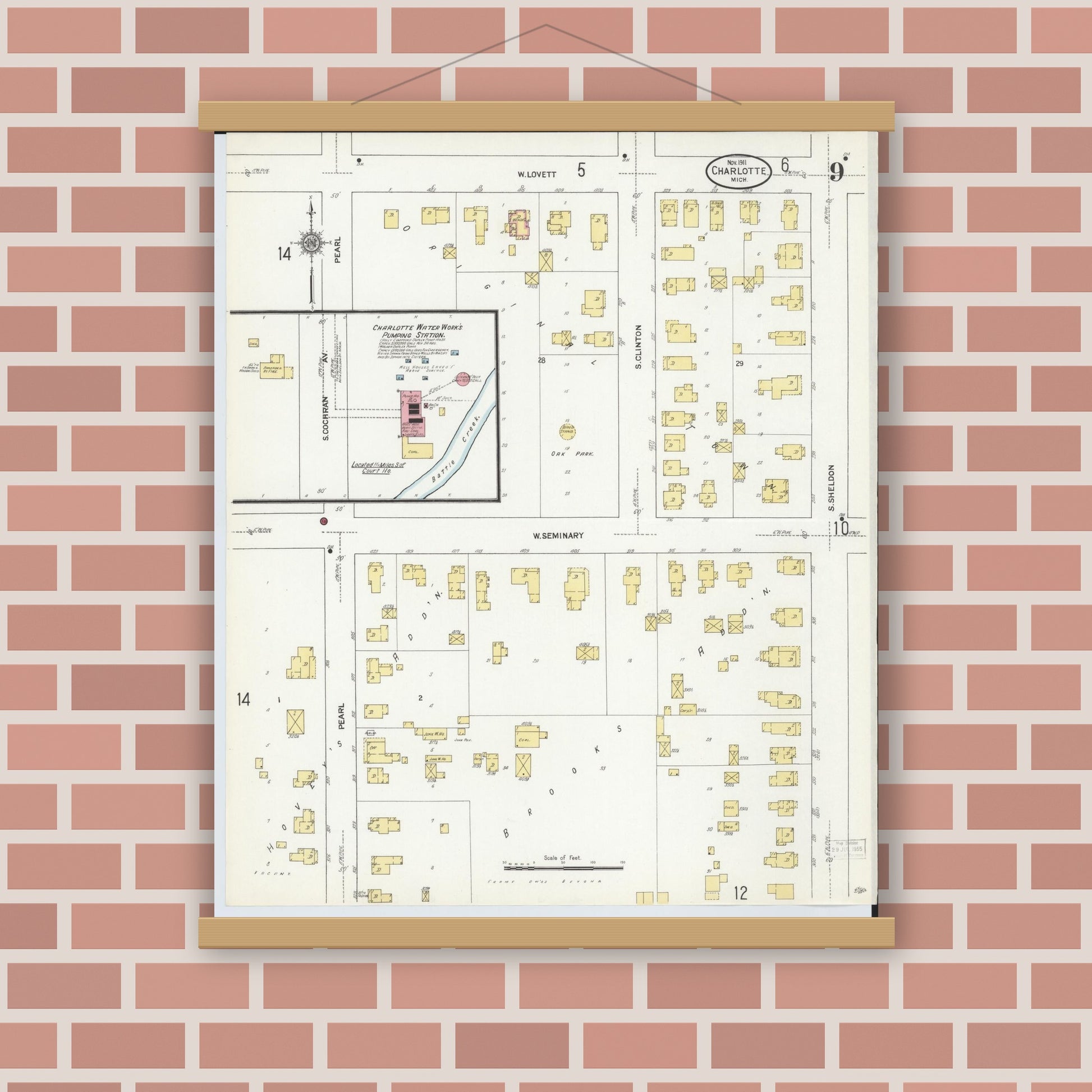Old map wall art mockup — magnetic wood frame on brick wall — Sanborn Fire Insurance Map from Charlotte, Eaton County, Michigan (1911), Sheet #0009