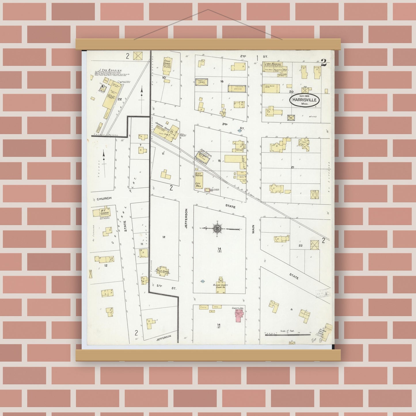Old map wall art mockup — magnetic wood frame on brick wall — Sanborn Fire Insurance Map from Harrisville, Alcona County, Michigan (1910), Sheet #0002