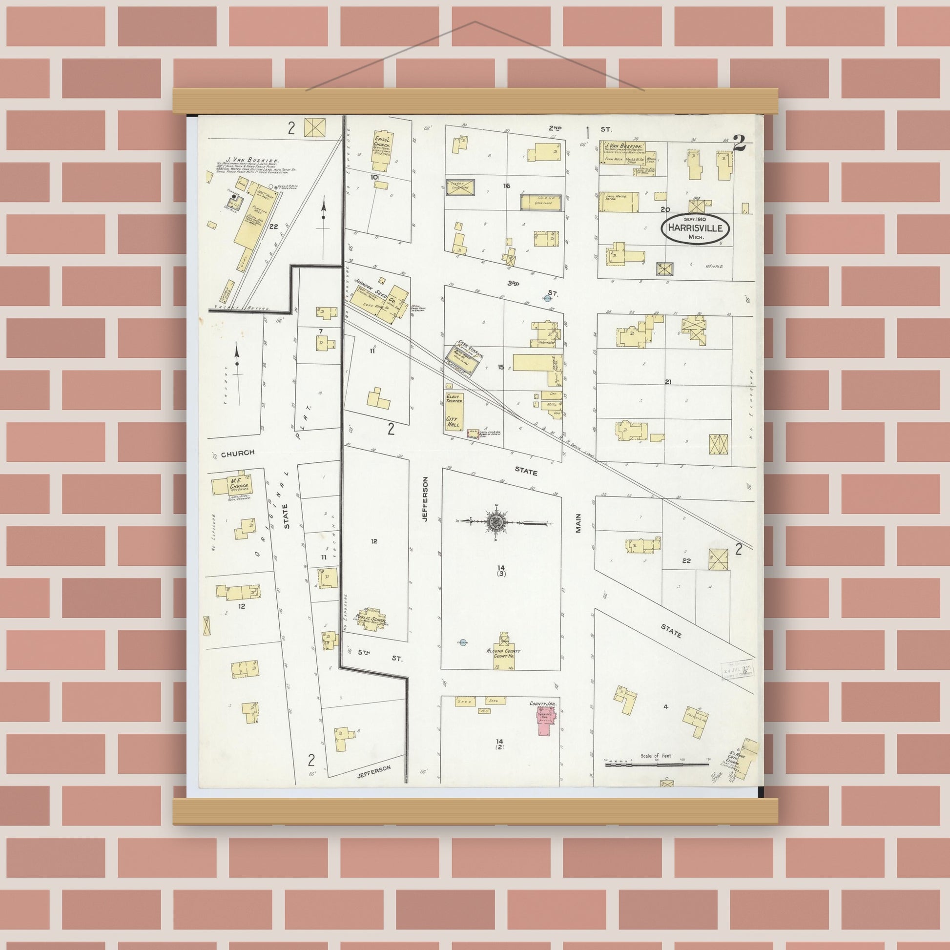 Old map wall art mockup — magnetic wood frame on brick wall — Sanborn Fire Insurance Map from Harrisville, Alcona County, Michigan (1910), Sheet #0002