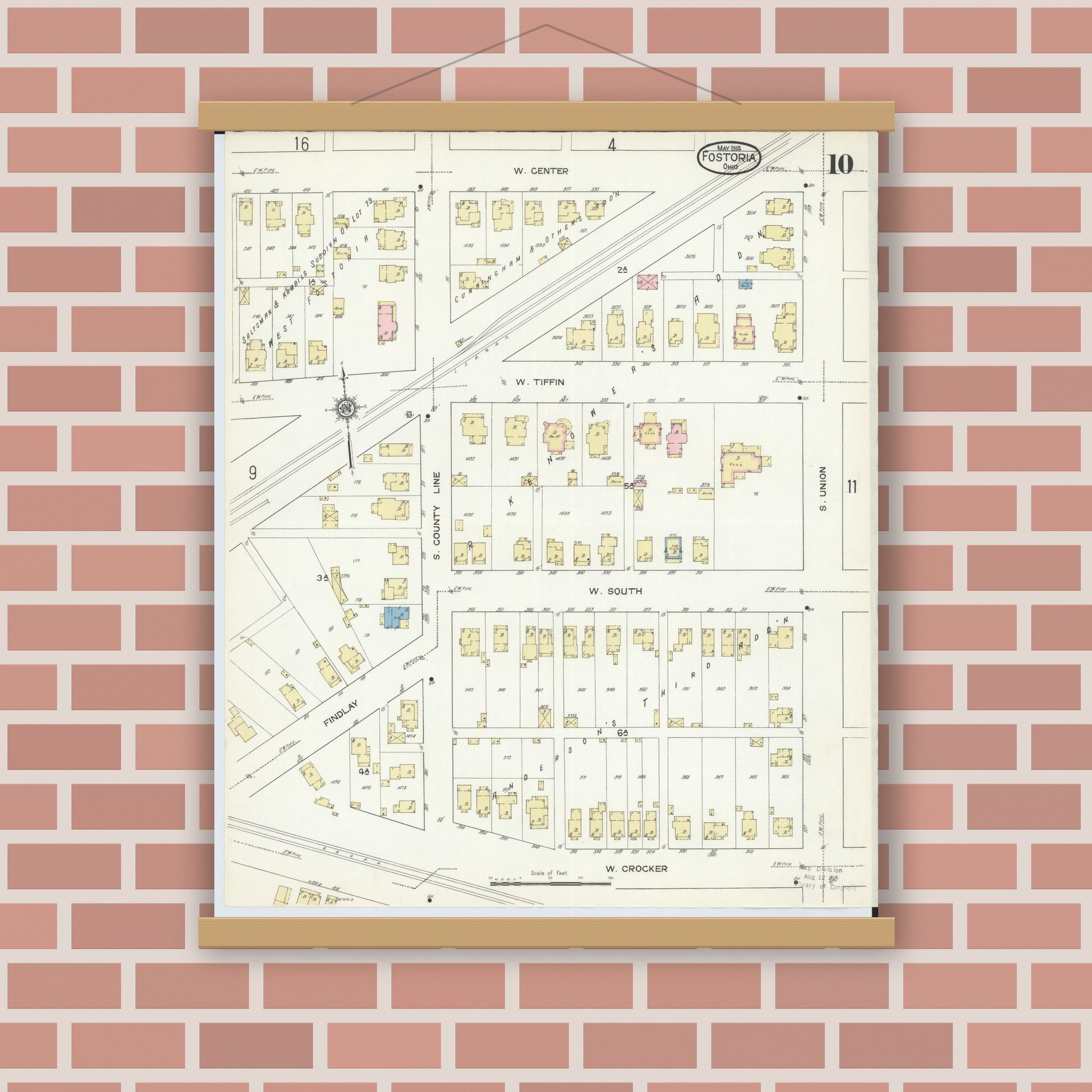 Old map wall art mockup — magnetic wood frame on brick wall — Sanborn Fire Insurance Map from Fostoria, Seneca, Hancock, And Wood Counties, Ohio (1914), Sheet #0010