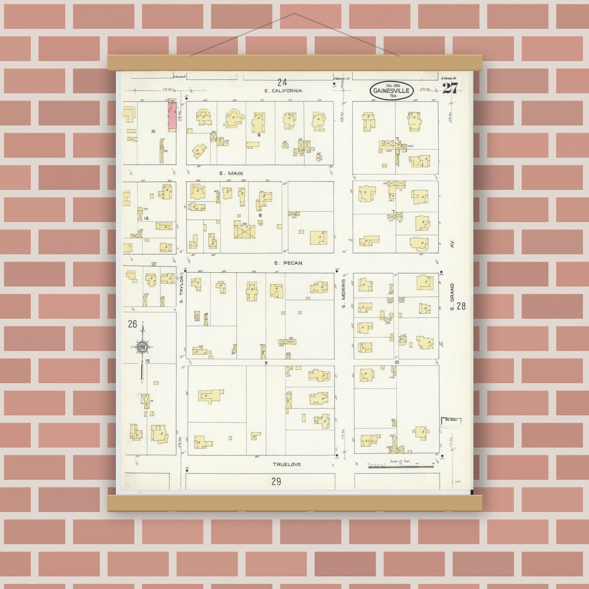 Old map wall art mockup — magnetic wood frame on brick wall — Sanborn Fire Insurance Map from Gainesville, Cooke County, Texas (1913), Sheet #0027