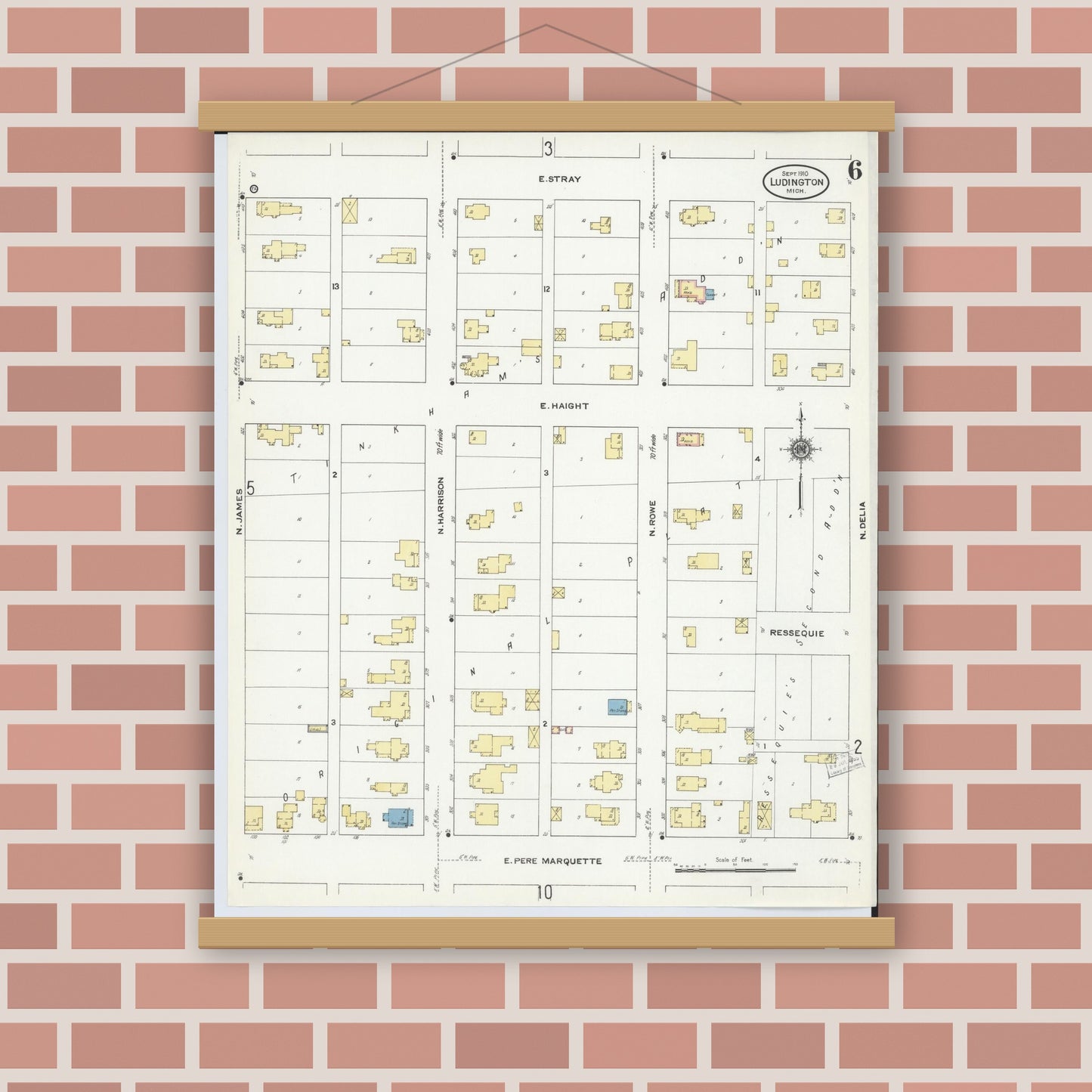 Old map wall art mockup — magnetic wood frame on brick wall — Sanborn Fire Insurance Map from Ludington, Mason County, Michigan (1910), Sheet #0006