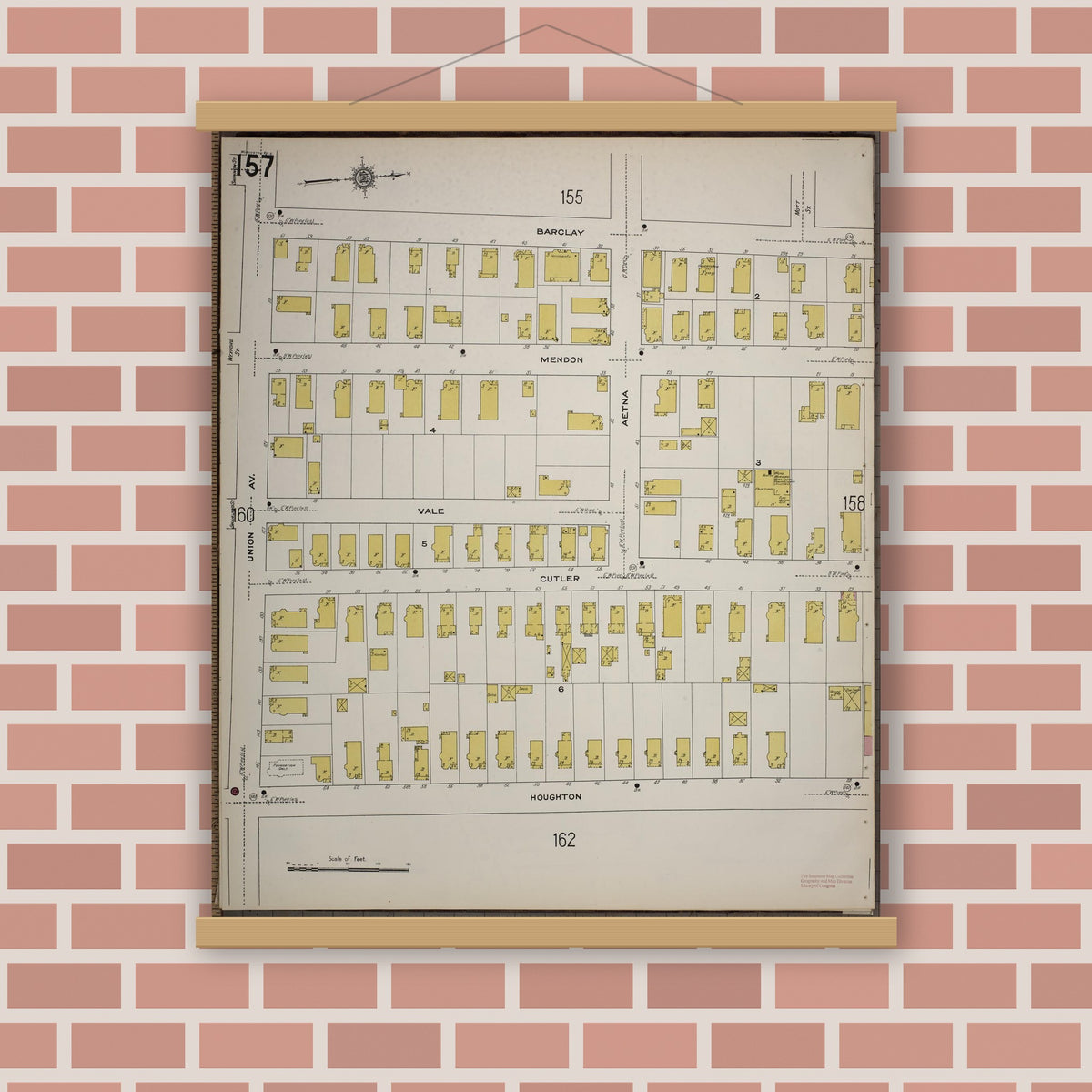 Old map wall art mockup — magnetic wood frame on brick wall — Sanborn Fire Insurance Map from Worcester, Worcester County, Massachusetts (1910), Sheet #0157