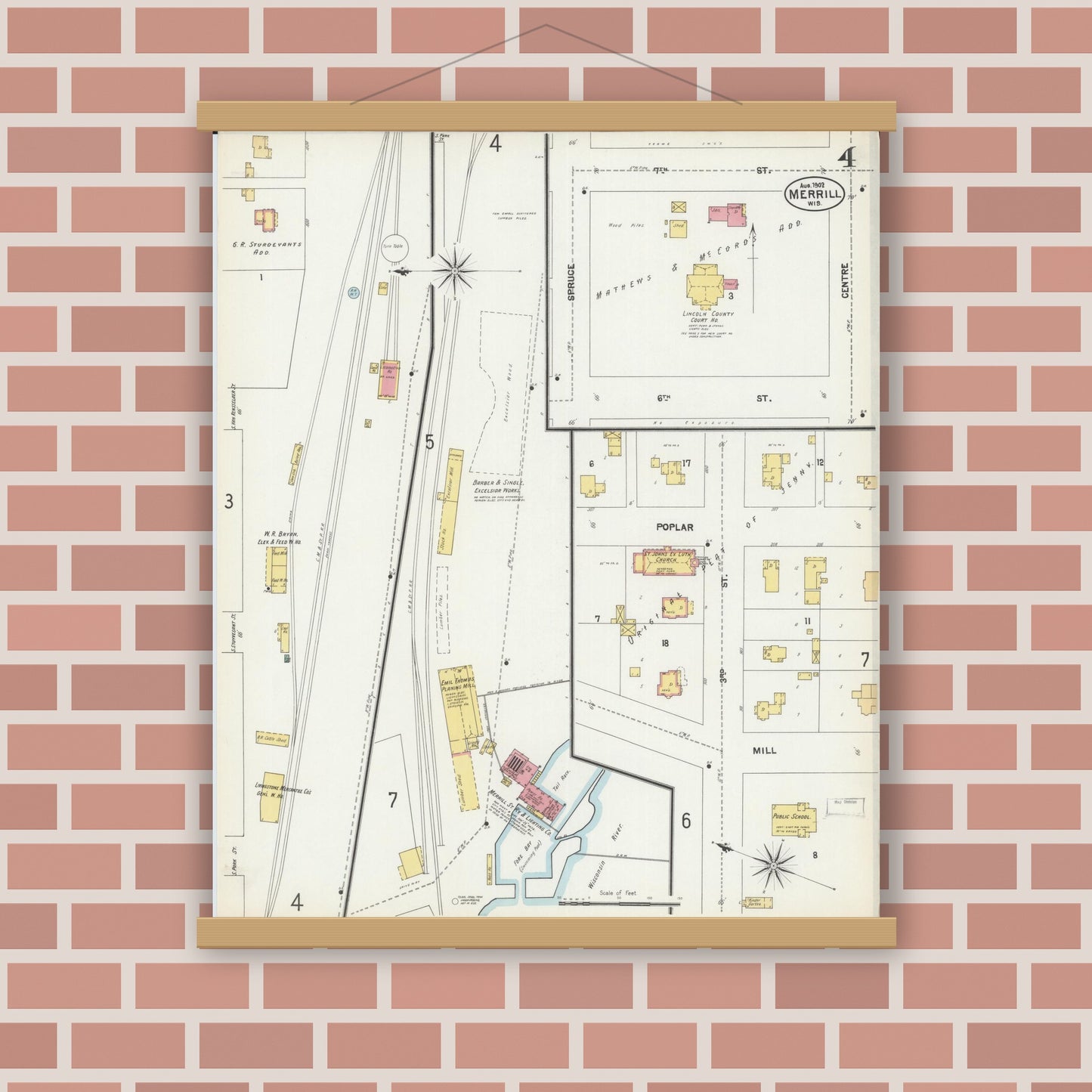 Old map wall art mockup — magnetic wood frame on brick wall — Sanborn Fire Insurance Map from Merrill, Lincoln County, Wisconsin (1902), Sheet #0004