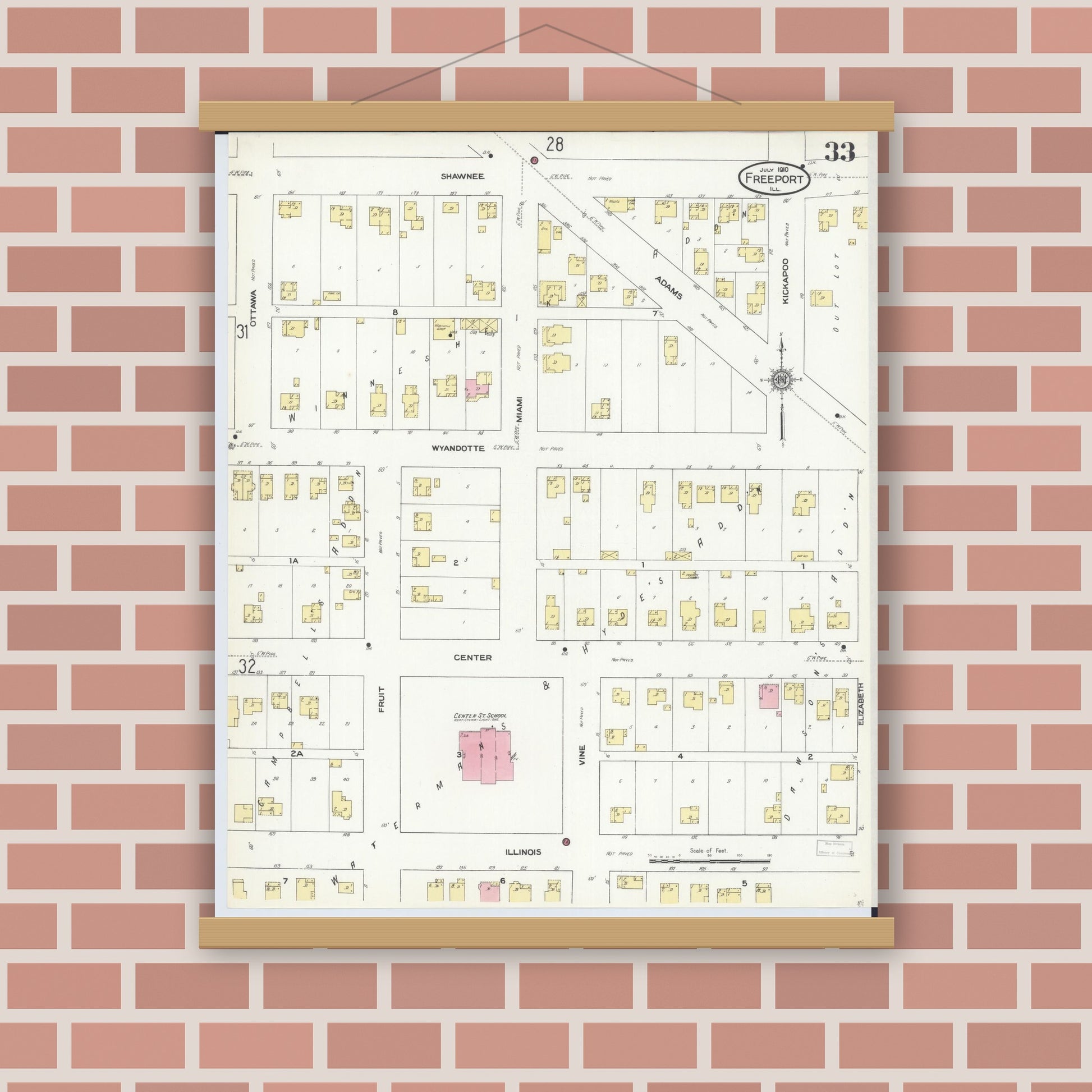 Old map wall art mockup — magnetic wood frame on brick wall — Sanborn Fire Insurance Map from Freeport, Stephenson County, Illinois (1910), Sheet #0033